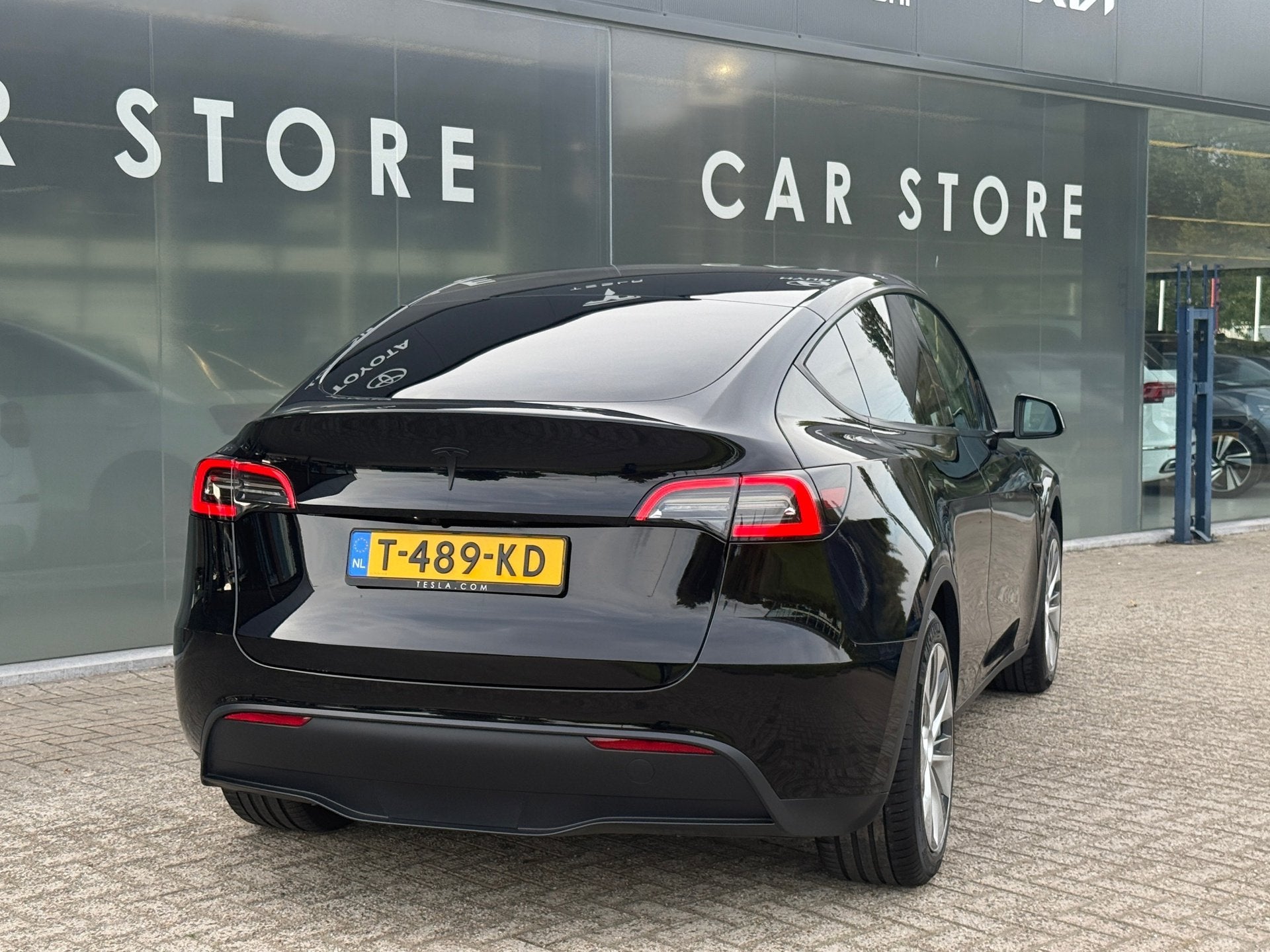 Foto 3 van Tesla Model Y RWD 58 kWh 91% SOH LFP Autopilot