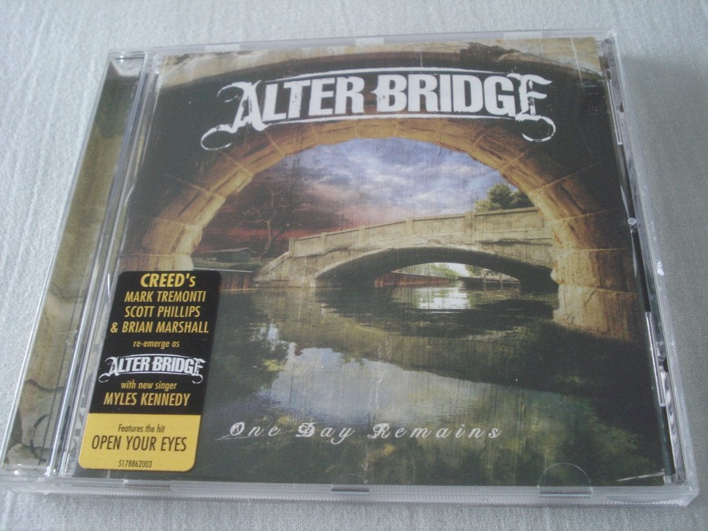 ALTER BRIDGE - A DAY REMAINS, Cd's en Dvd's, Ophalen of Verzenden, Zo goed als nieuw, Inclusief boekje, Alternative Rock
