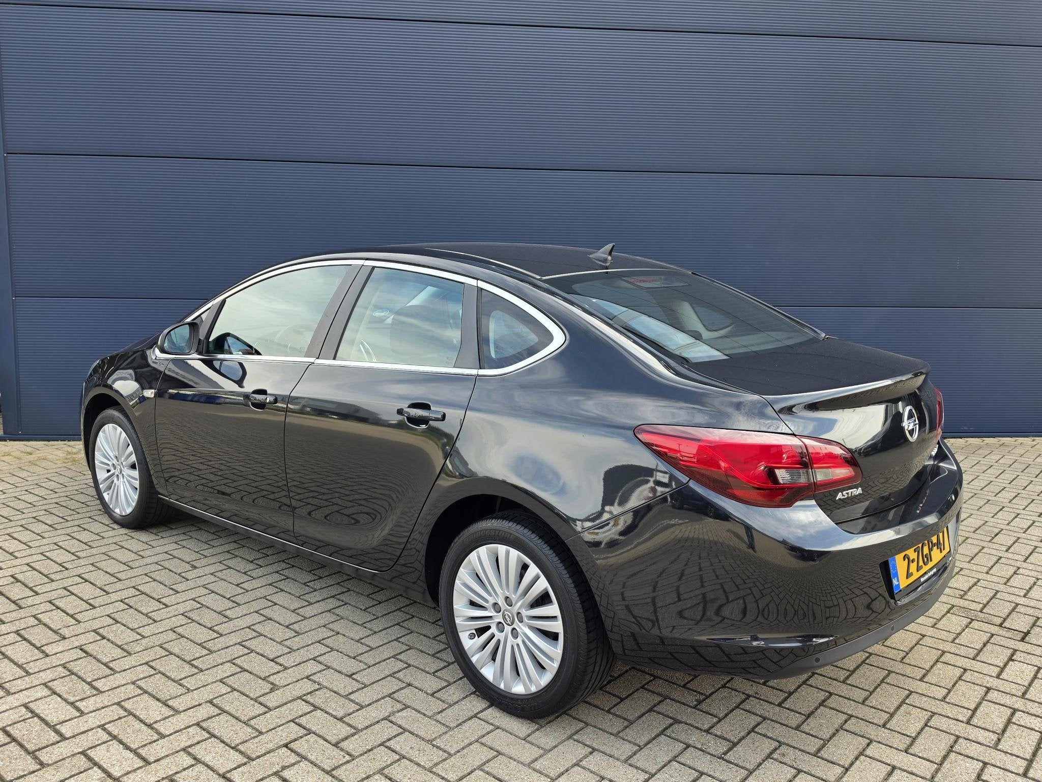 Opel Astra 1.4 Design Edition | Airco | Parkeersensoren | Na, Auto's, Voorwielaandrijving, Euro 5, Gebruikt, 4 cilinders