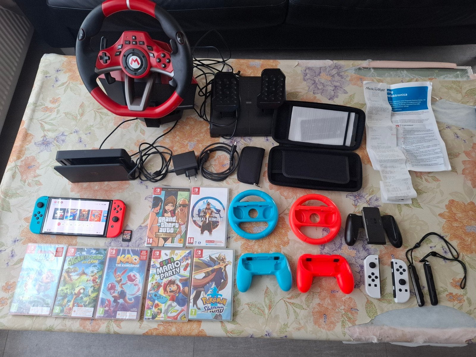 Nintendo Switch OLED met 8 games, stuur en accessoires, Spelcomputers en Games, Spelcomputers | Nintendo Switch, Ophalen of Verzenden