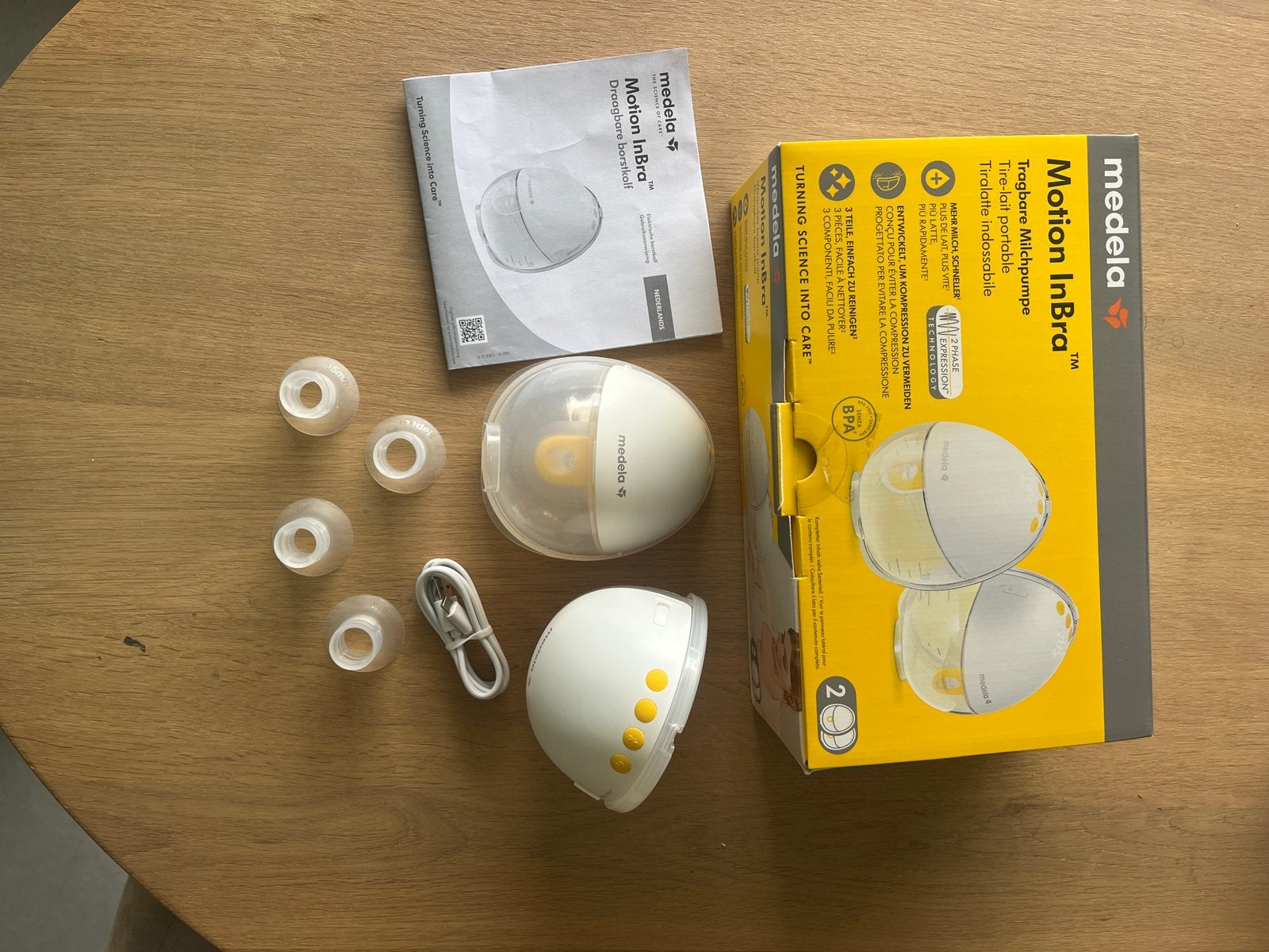 Medela Motion InBra Borstkolf Dubbelzijdig Elektrisch, Ophalen of Verzenden, Zo goed als nieuw, Borstkolf