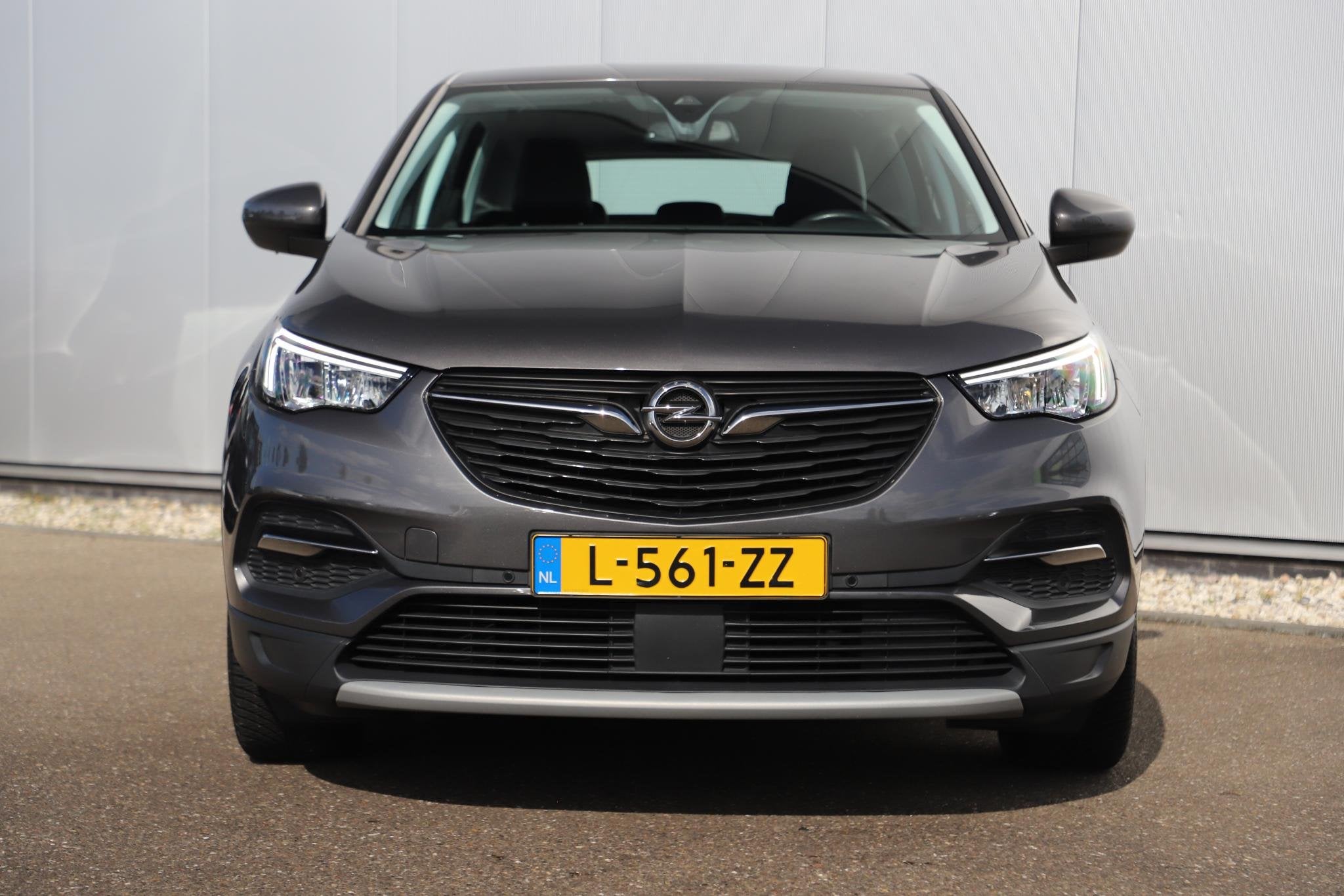 Opel Grandland X 1.2 Turbo Elegance 131PK Automaat LMV Sport, Auto's, Gebruikt, 1199 cc, Met garantie (alle), Leder en Stof