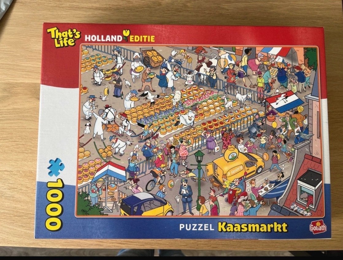 That's Life Holland Editie Puzzel Kaasmarkt 1000 stukjes, Hobby en Vrije tijd, Denksport en Puzzels, Ophalen of Verzenden, 500 t/m 1500 stukjes