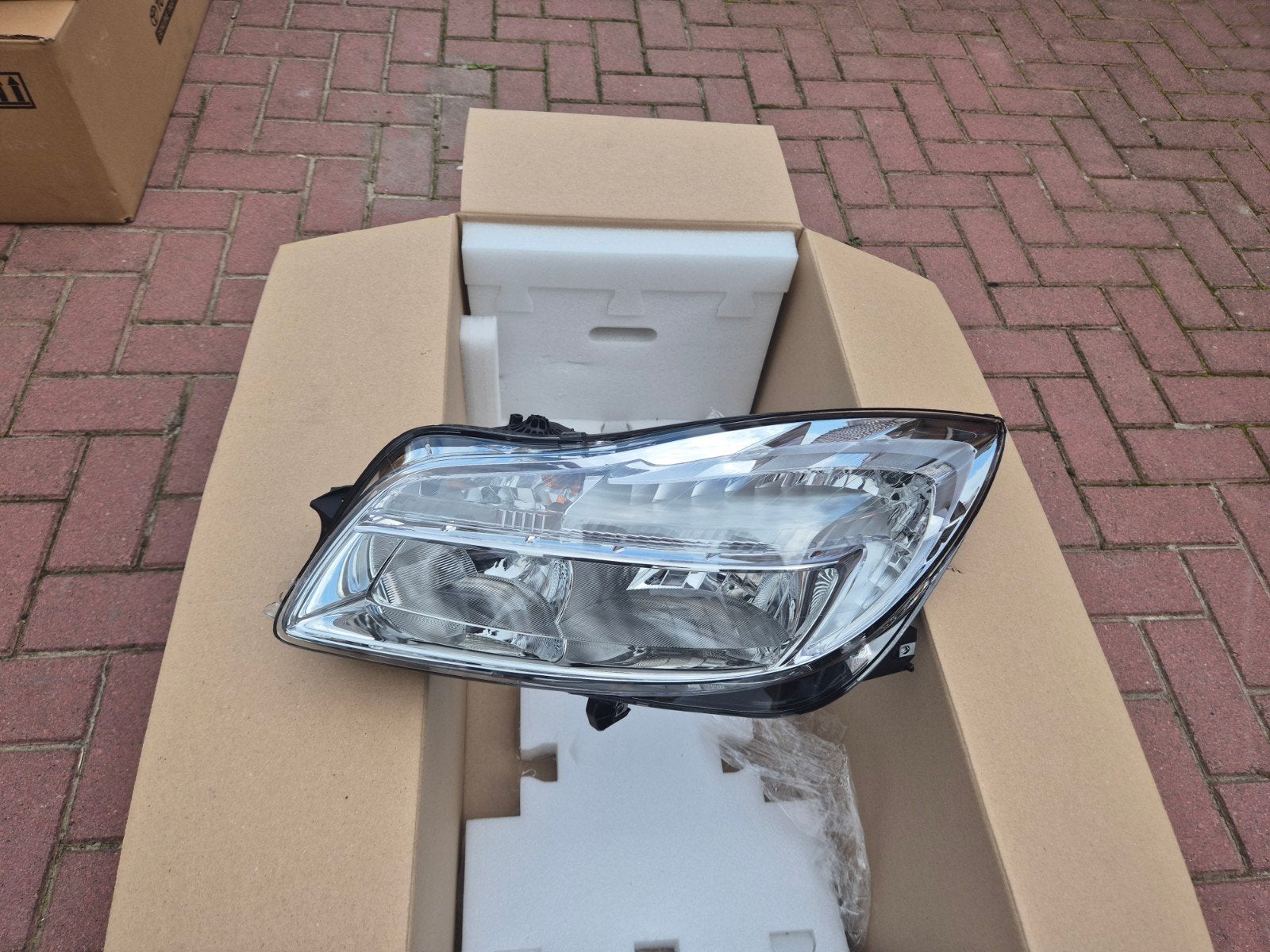 Opel insignia koplamp links '08-'13, Ophalen of Verzenden, Opel