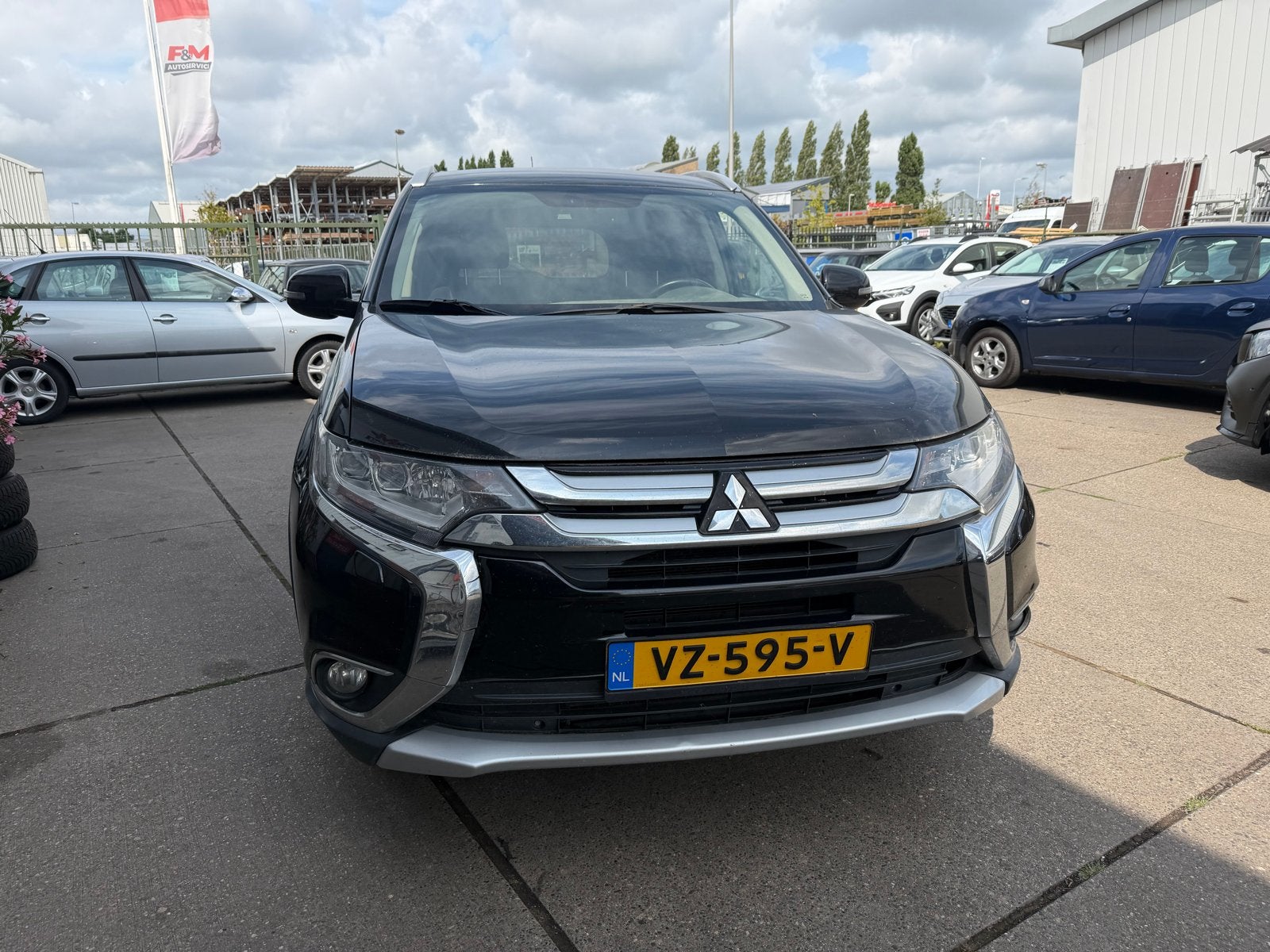 Mitsubishi Outlander 2016 grijs kenteken., Auto's, 2268 cc, Zwart, Origineel Nederlands, 19 km/l