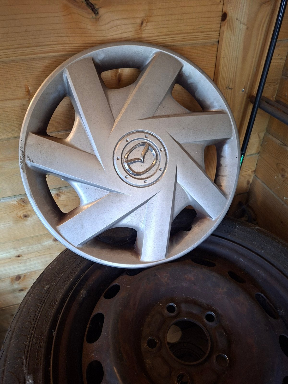 Mazda wieldop en stalen velgen met banden, Ophalen, Gebruikt