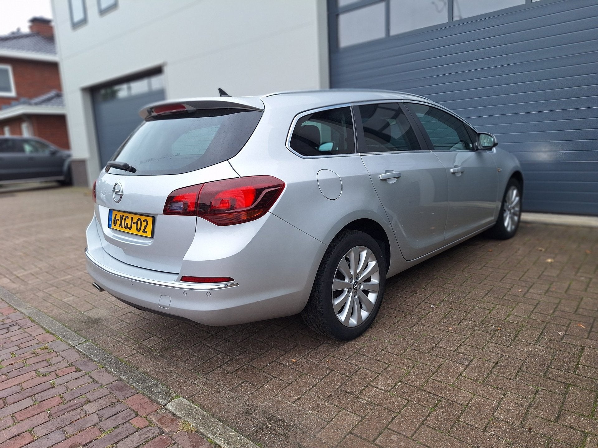 Opel Astra Sports Tourer | 1.4 Turbo Cosmo | Camera | Cruise, Auto's, Voorwielaandrijving, Euro 5, Gebruikt, 4 cilinders