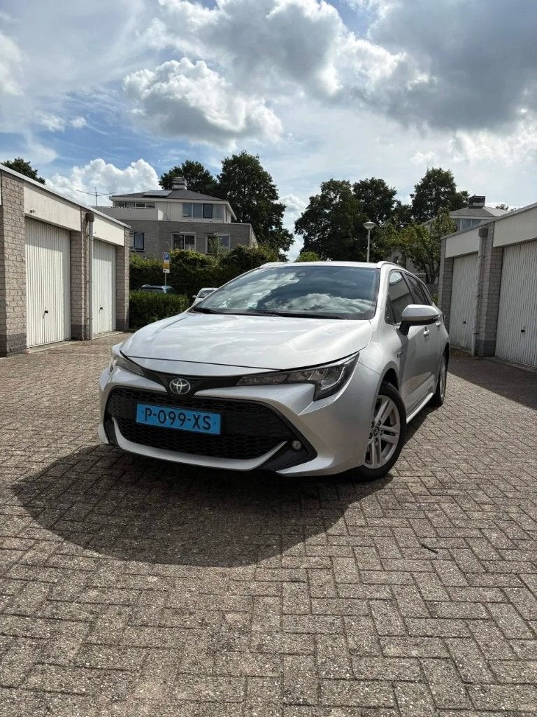 Toyota Corolla Touring Sport 2020 1.8 Hybrid Zilver, Auto's, Corolla, 98 pk, Volledig hybride, 66 €/maand