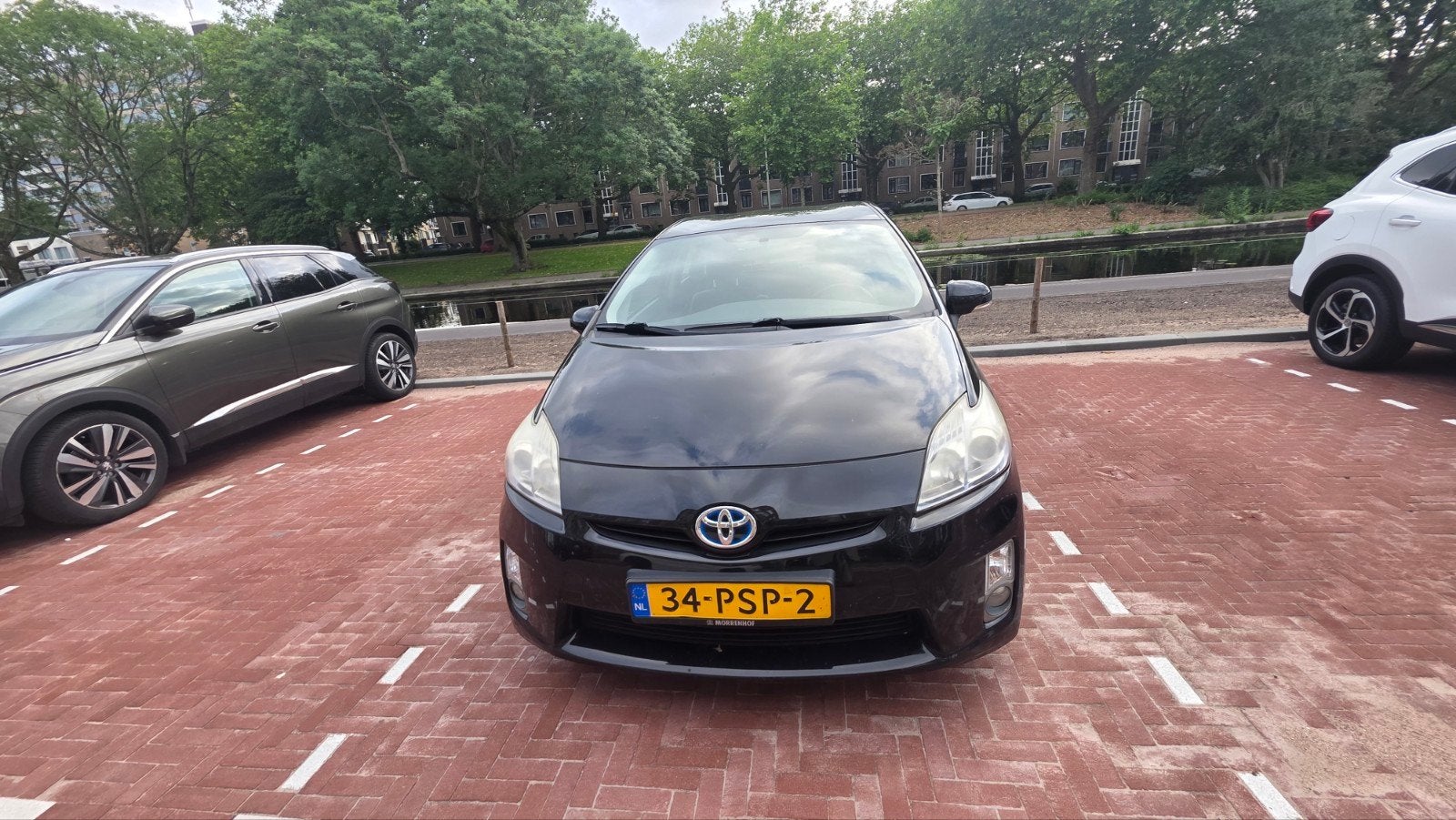 Toyota Prius 1.8 Full Hybrid 136PK Aut 2011 Zwart, Auto's, Toyota, 1380 kg, 4 cilinders, Zwart, Prius