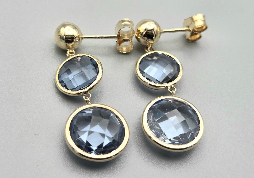 Gouden oorbellen met edelsteen topaas. Nr: 35, Blauw, Ophalen of Verzenden, Zo goed als nieuw, Met edelsteen