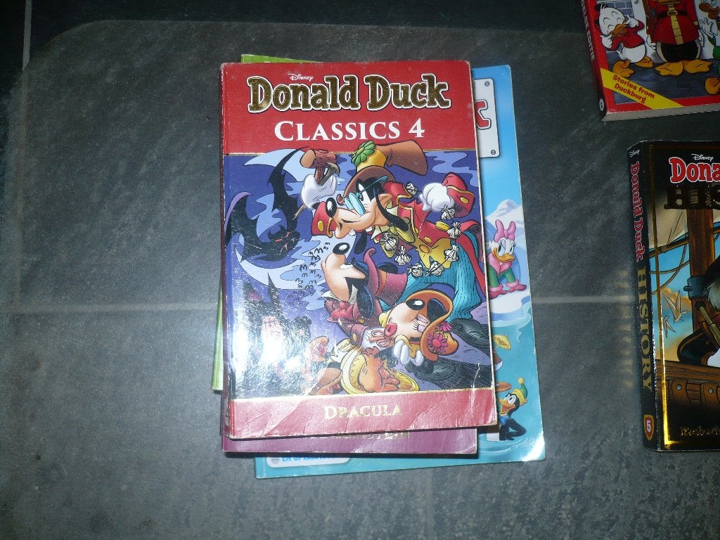 6 speciale donald duck pockets en een vakantie boek, Gelezen, Ophalen of Verzenden, Donald Duck, Meerdere stripboeken