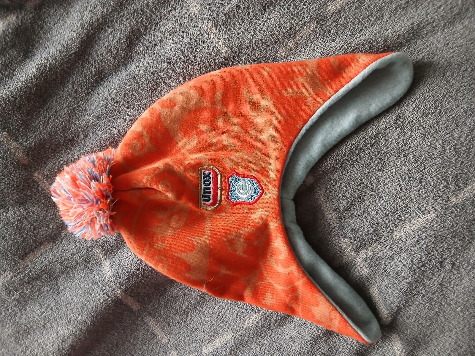 Unox Mutsje met Pompon - Oranje/Blauw. zie omschrijving, Jongetje of Meisje, Ophalen of Verzenden, Muts, Unox