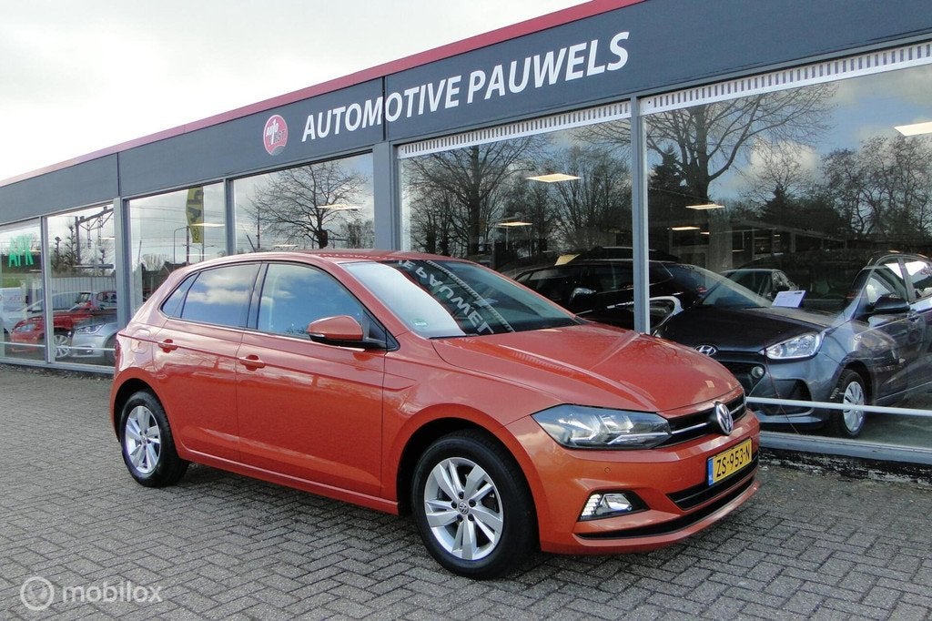 Volkswagen Polo benzine automaat, 107.410 km, Auto's, Stof, Gebruikt, Met garantie (alle), 49 €/maand
