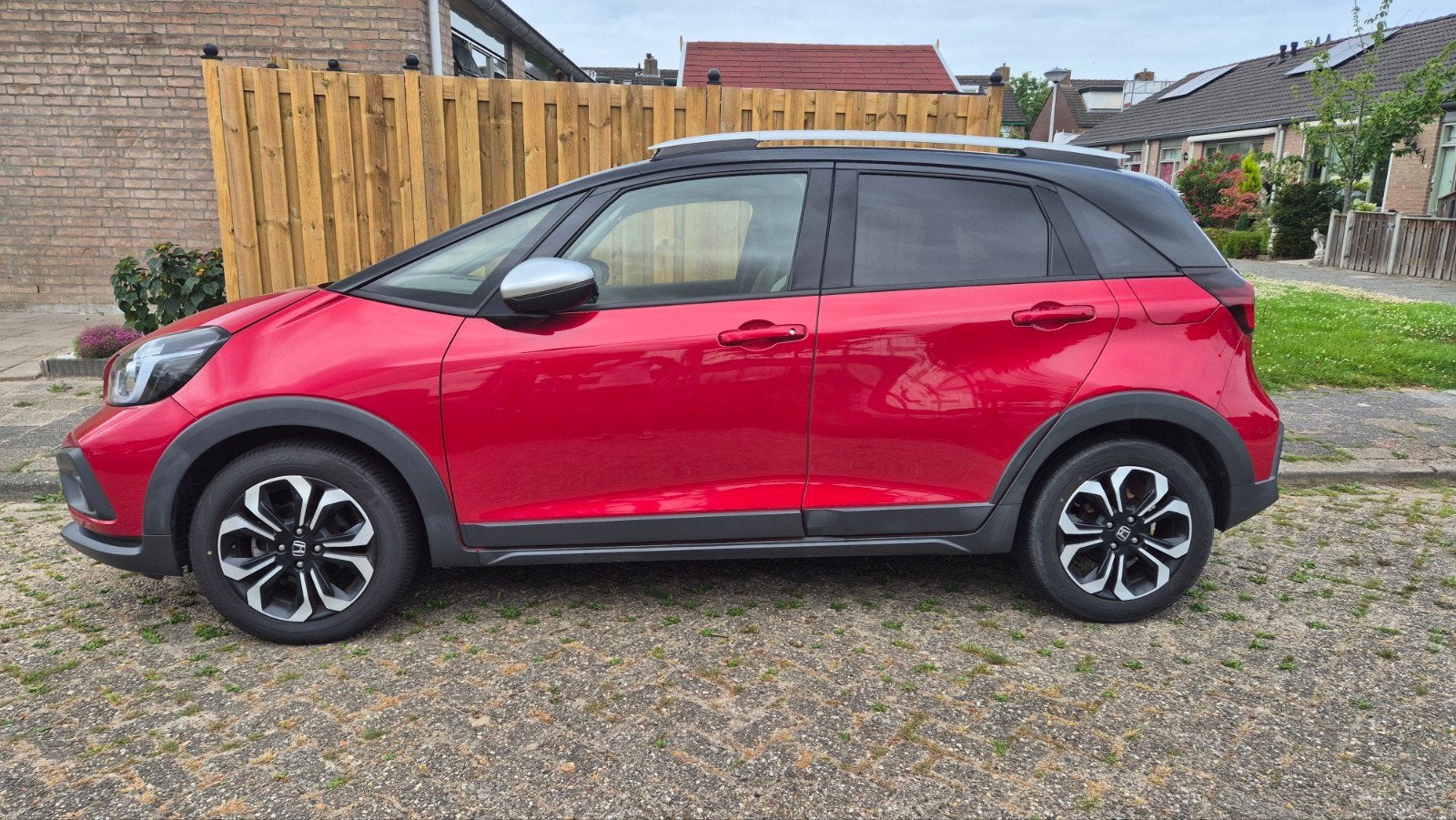 Honda Jazz 1.5 109pk Hybrid CVT 2021 Rood (Geen handelaren), Auto's, Honda, Stof, 1498 cc, 1225 kg, 4 cilinders