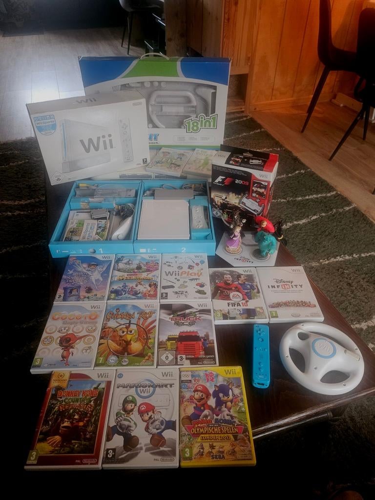 Wii Sports editie (CIB) met leuke extra's en 15 spellen., Ophalen of Verzenden, Zo goed als nieuw, Met 2 controllers, Met stuurtje