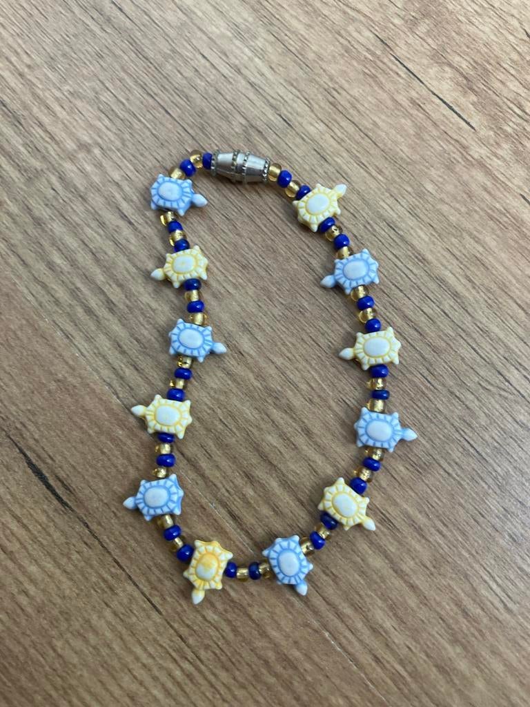 Schildpadden Armband - Blauw en Geel, Sieraden, Tassen en Uiterlijk, Armbanden, Blauw, Kunststof of Plastic, Nieuw, Ophalen of Verzenden