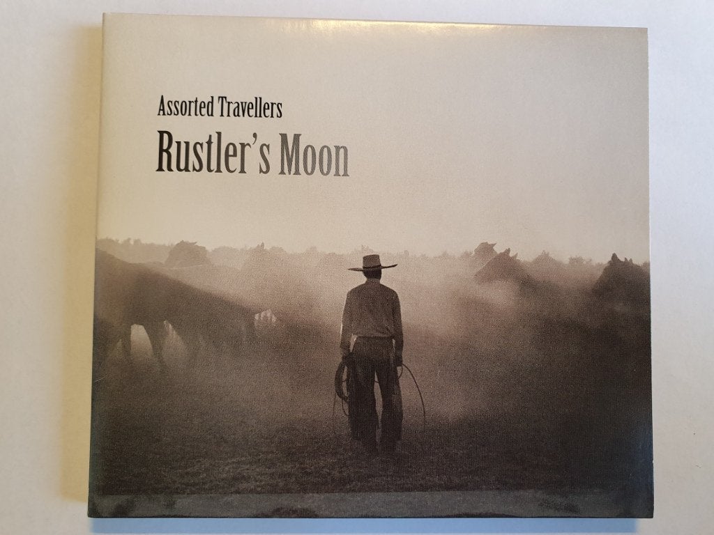 CD / EP Assorted Travellers - Rustler's Moon (P) Tim Knol, Inclusief boekje, Ophalen of Verzenden, Zo goed als nieuw, Poprock