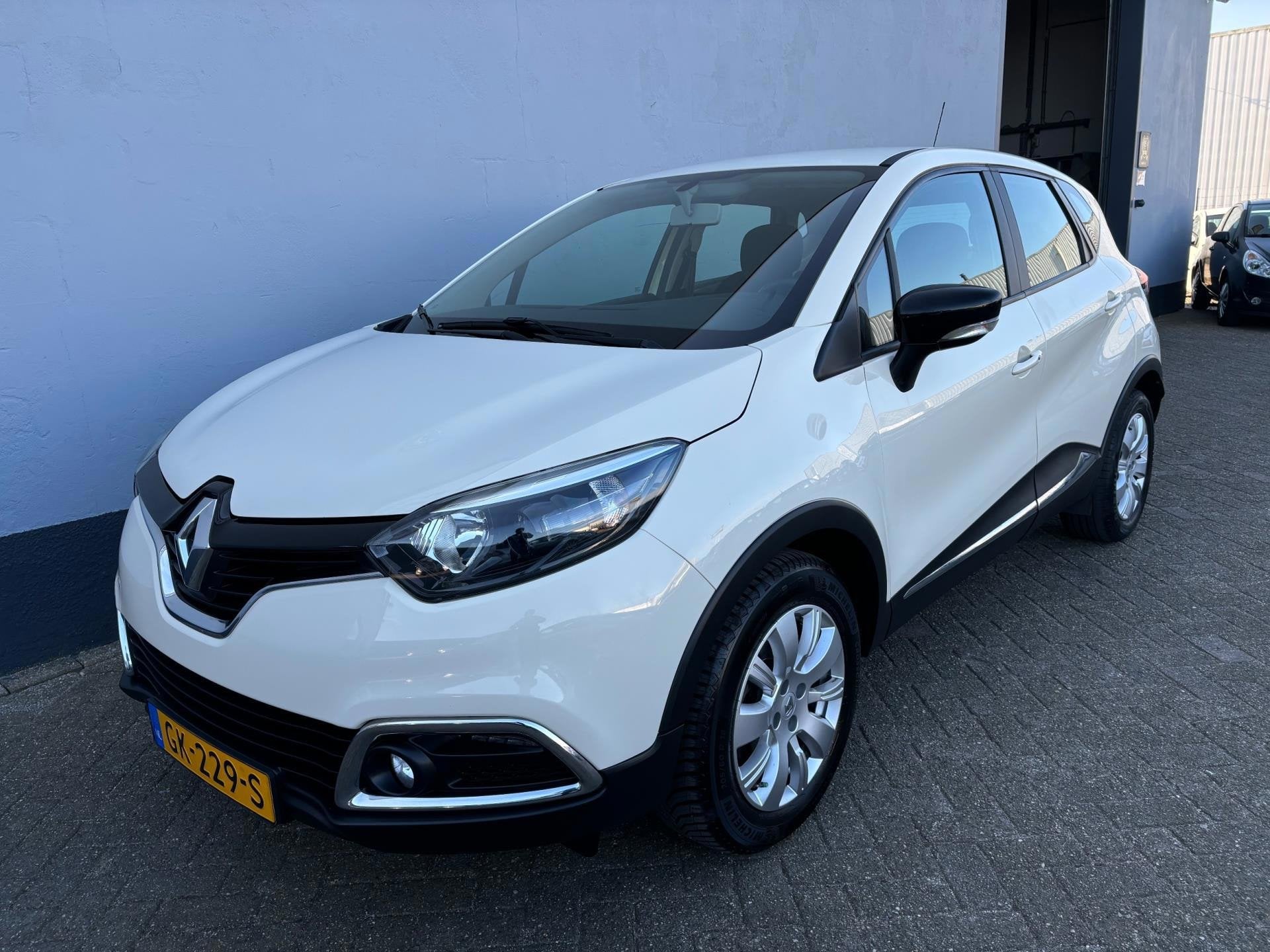 Renault Captur 1.2 TCe Expression Automaat, Auto's, Automaat, Euro 5, Met garantie (alle), Wit
