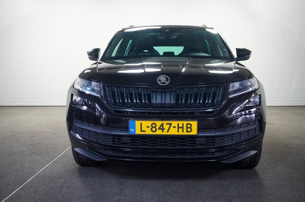Skoda Kodiaq 1.5 TSI Sportline Business 7p., Auto's, Skoda, Euro 6, 4 cilinders, 150 pk, Zwart