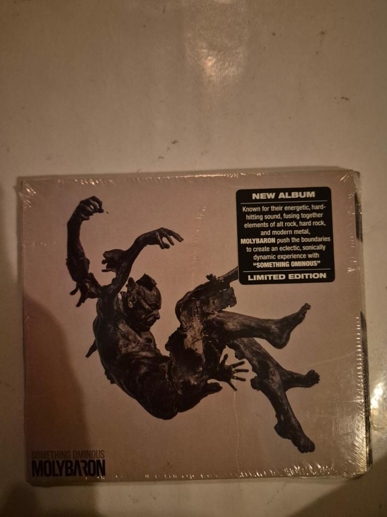 Molybaron - Something ominous. Cd. 2023. NIEUW, Ophalen of Verzenden, Nieuw in verpakking