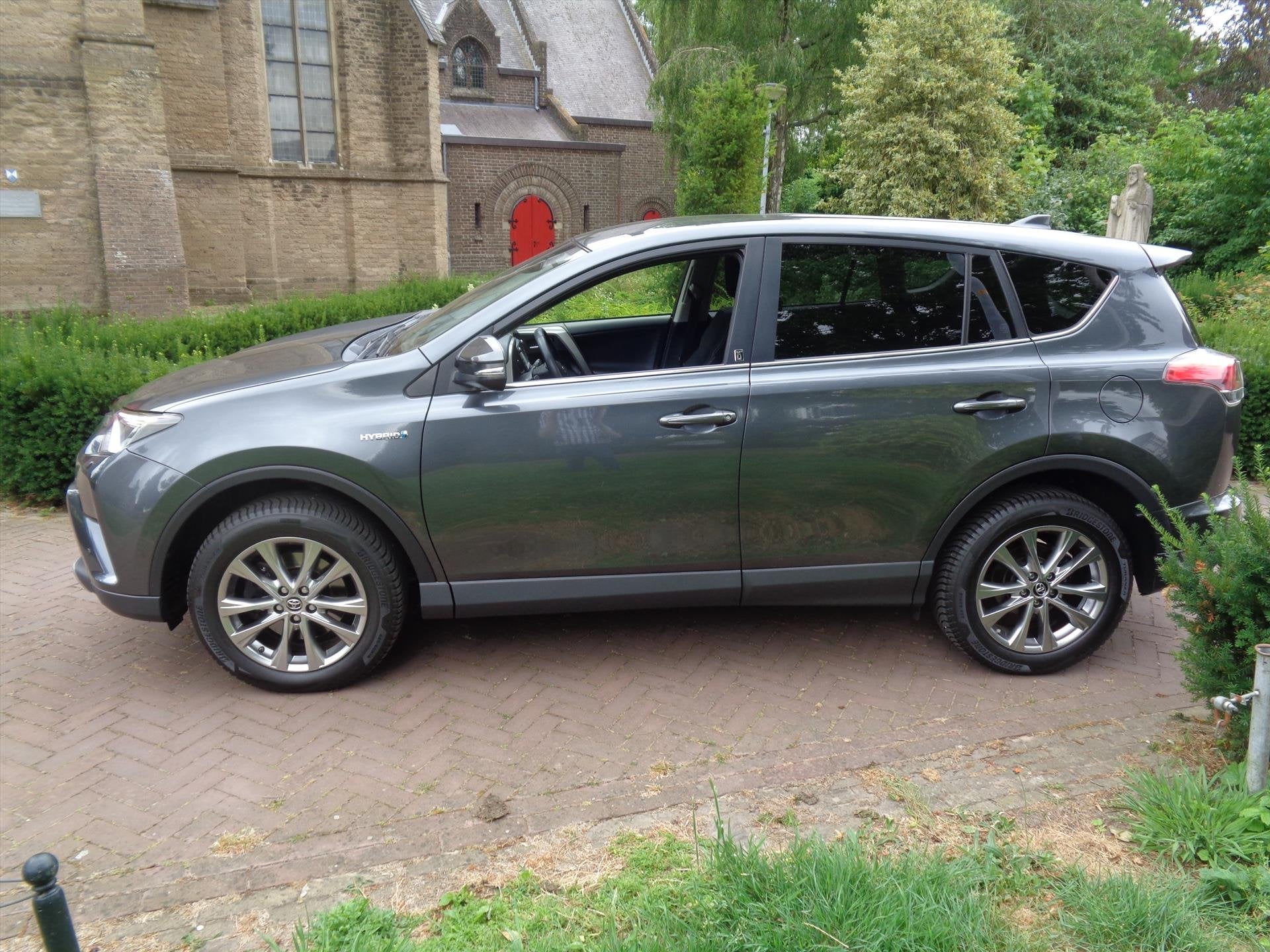 TOYOTA RAV4 2.5 VVT-i Hybrid 197pk AWD Aut Edition met 1650, Auto's, Automaat, Dealer onderhouden, Stof, Gebruikt