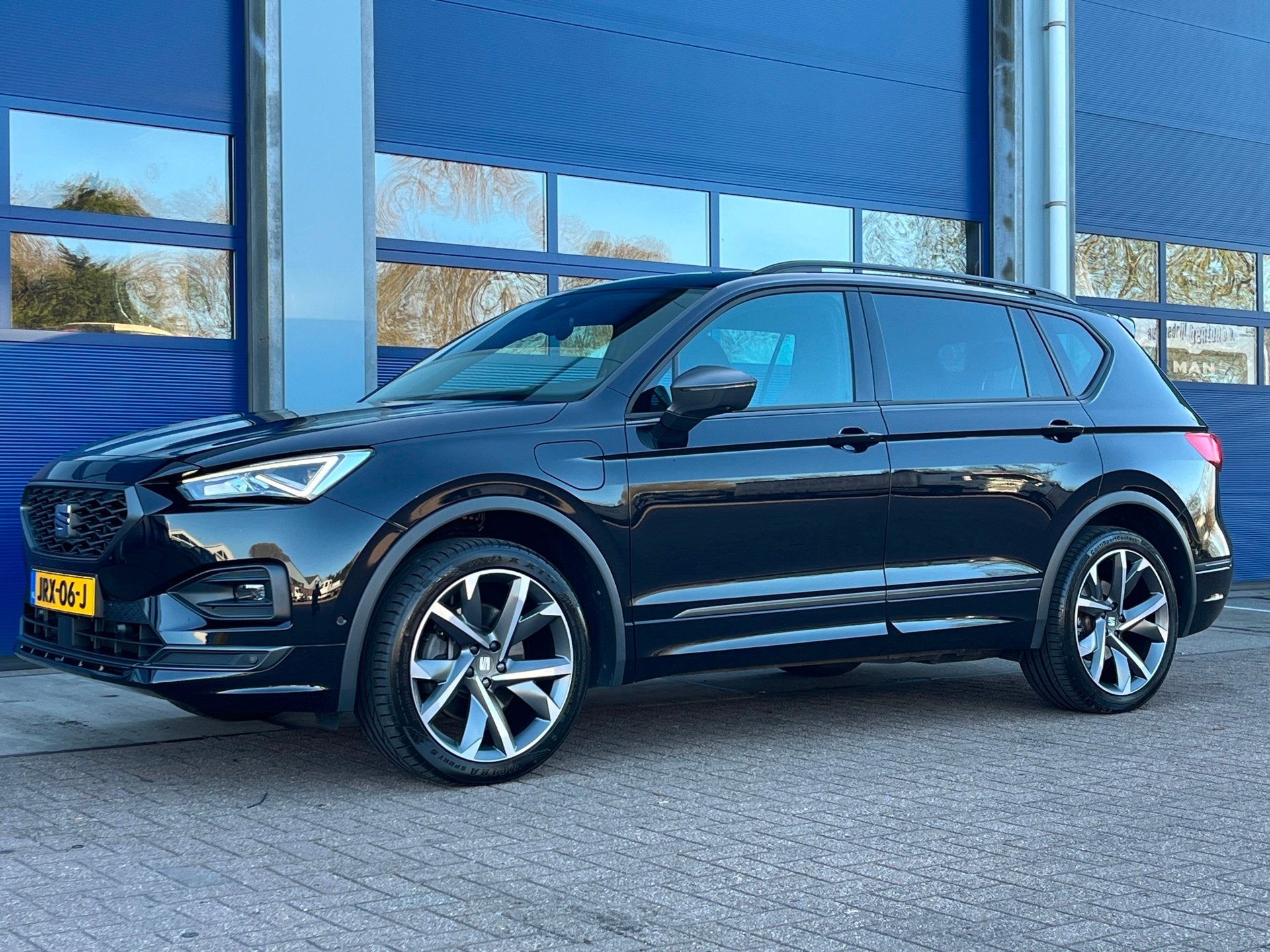 Seat TARRACO 1.4 TSI e-Hybrid PHEV 245pk FR | Panoramadak |, Auto's, Stof, 4 cilinders, Zwart, Hybride Elektrisch/Benzine