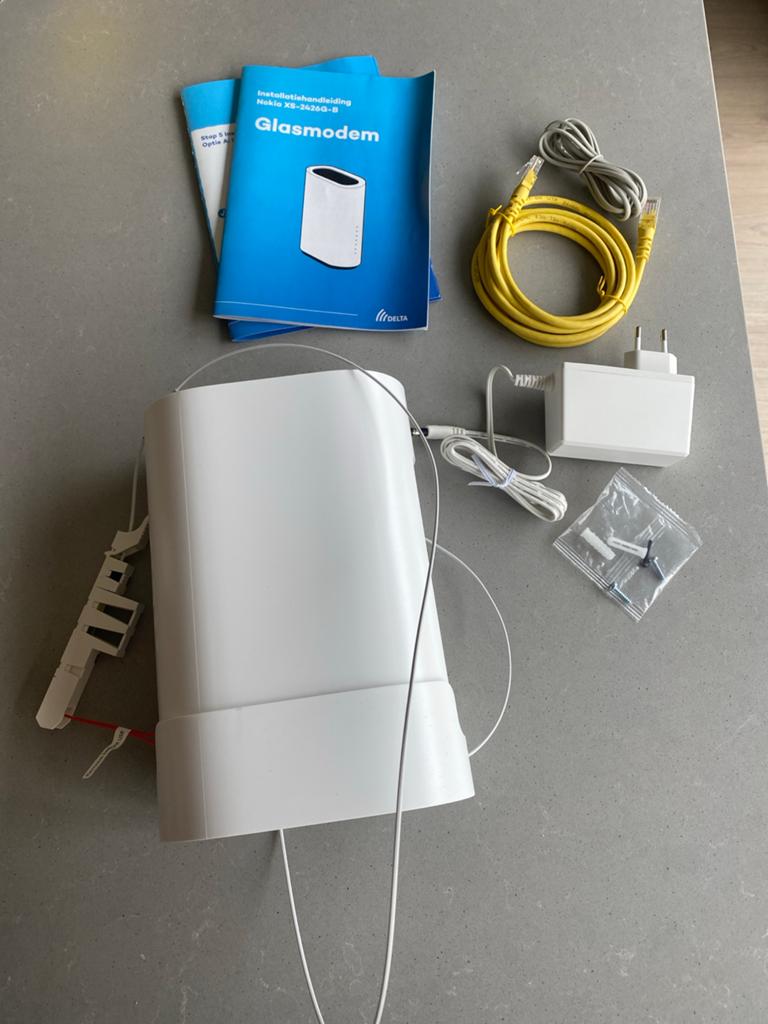 Nokia XS-2426G-B Glasmodem - Compleet in doos, Computers en Software, Routers en Modems, Ophalen of Verzenden, Zo goed als nieuw