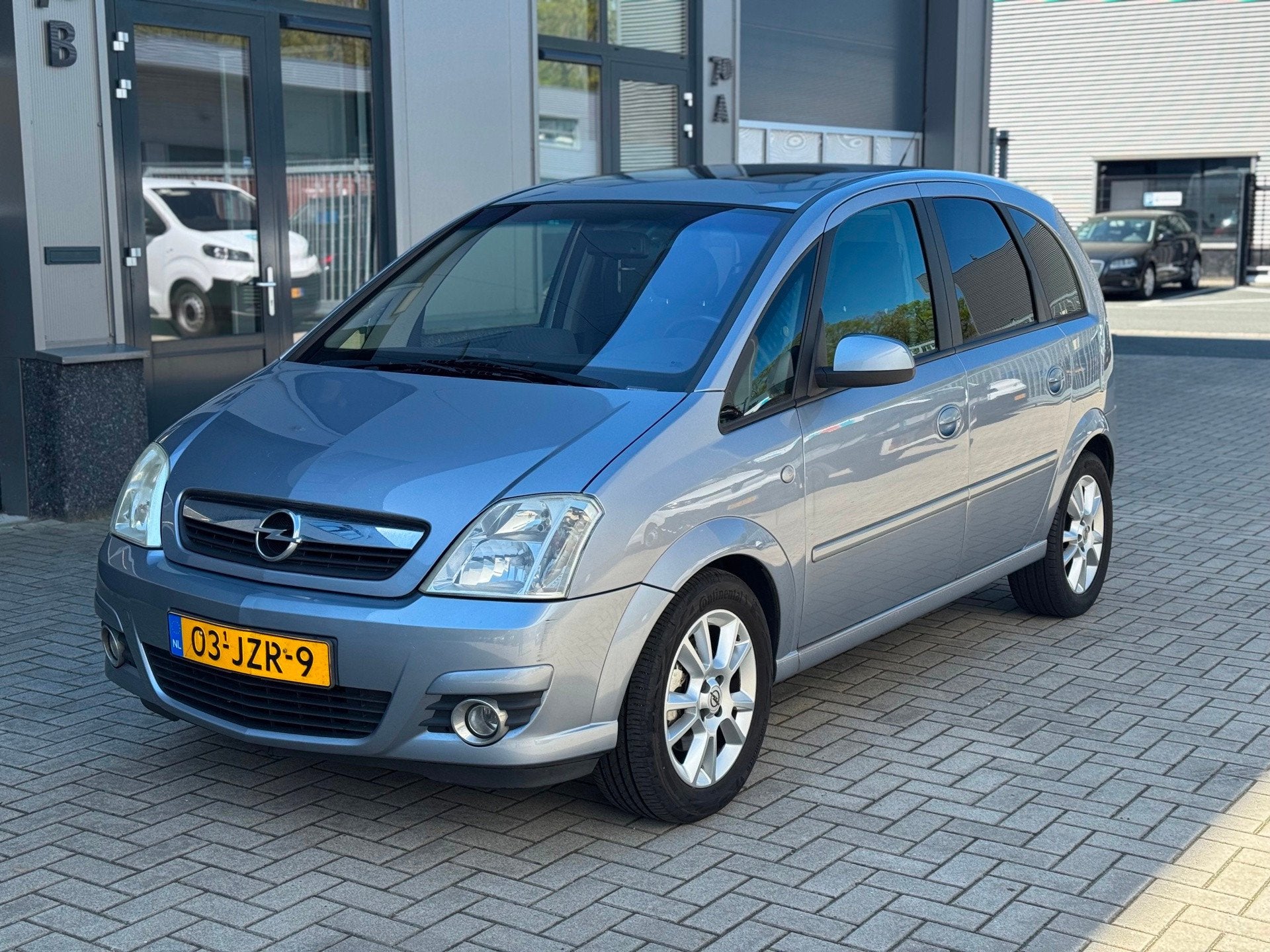 Opel Meriva 1.6-16V Cosmo, Voorwielaandrijving, 15 km/l, 4 cilinders, Leder en Stof
