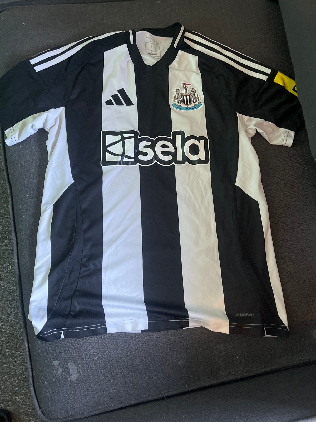 Newcastle United Thuisshirt Zwart/Wit Maat L, Ophalen, Zo goed als nieuw, Maat 52/54 (L), Zwart