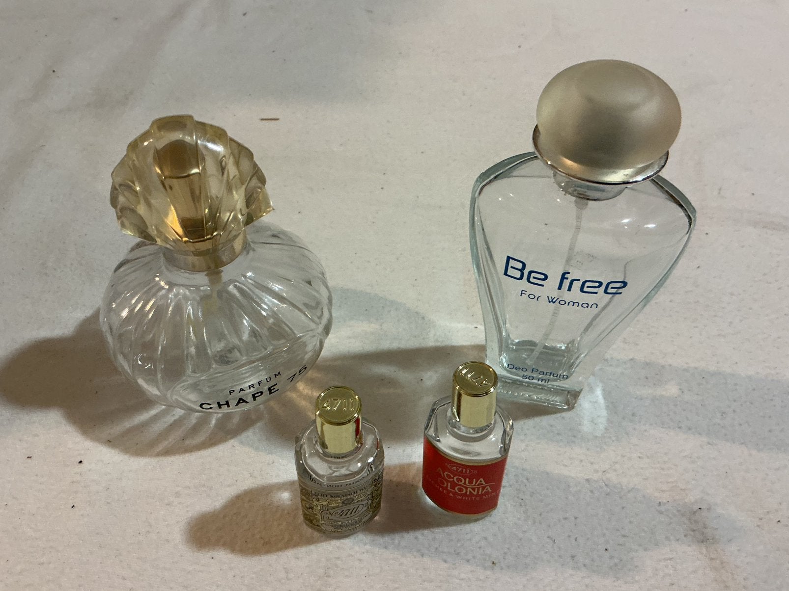 4 parfum flesjes, Ophalen of Verzenden, Zo goed als nieuw, Parfumfles