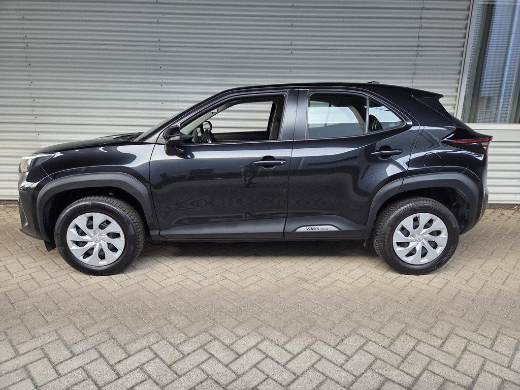 Toyota Yaris Cross 1.5 Hybrid Active, Auto's, Toyota, Stof, Gebruikt, 116 pk, Zwart