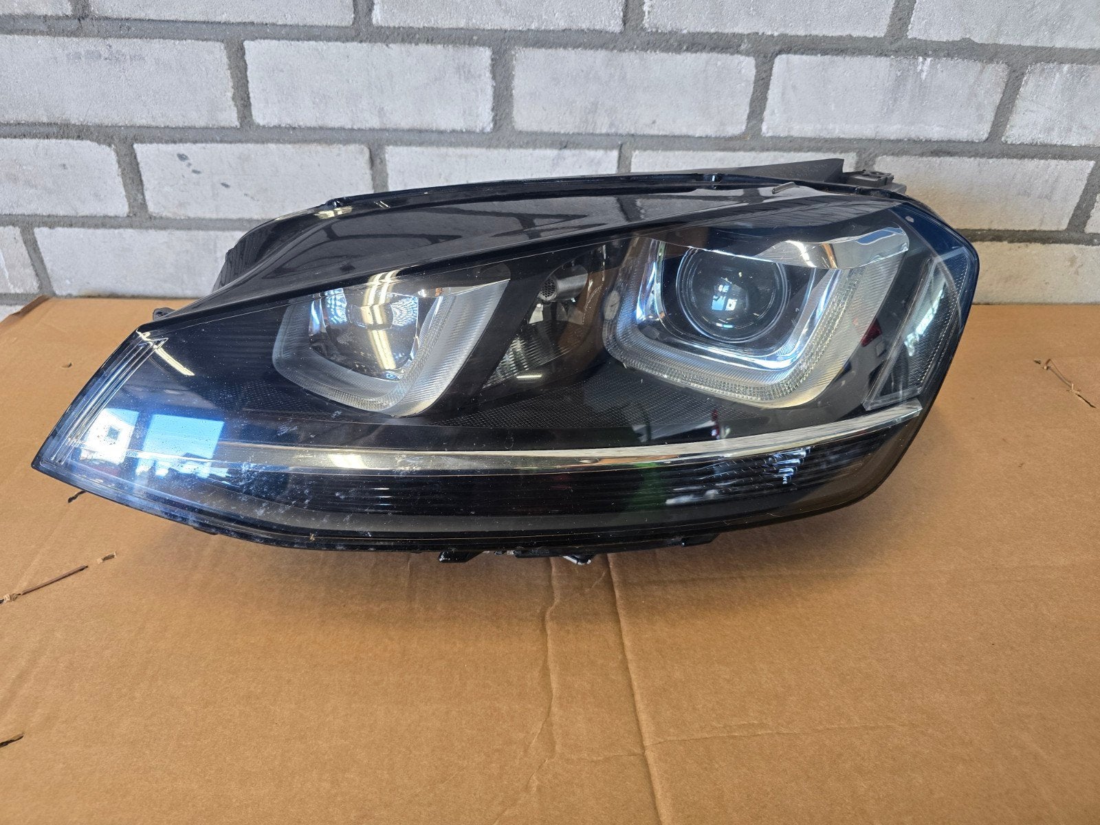 Vw golf 7 xenon koplamp Links, Ophalen of Verzenden