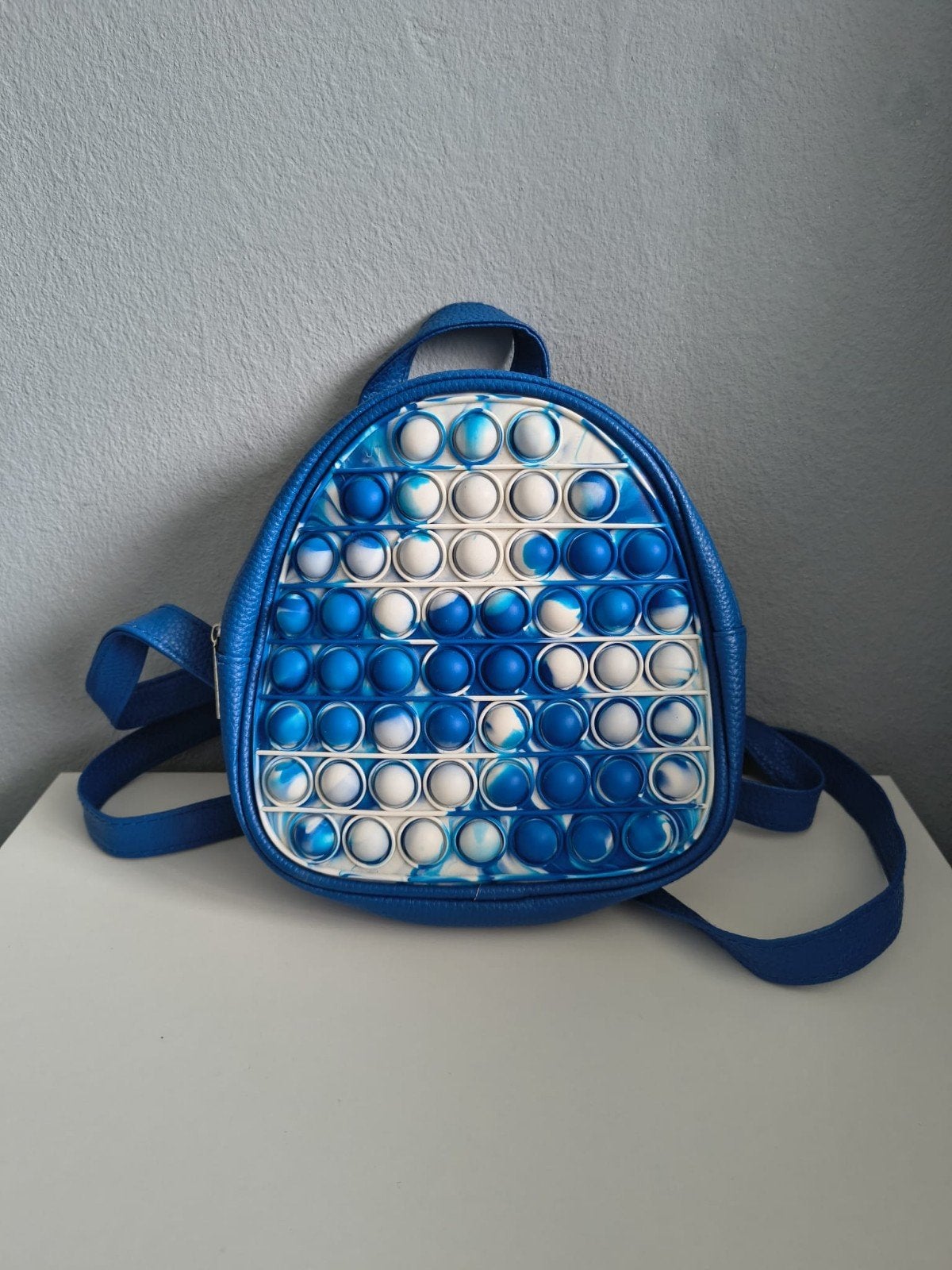 Leuke Pop It rugzak blauw/wit  bijna Nieuw!, Overige merken, Minder dan 30 cm, Ophalen of Verzenden, Minder dan 25 cm
