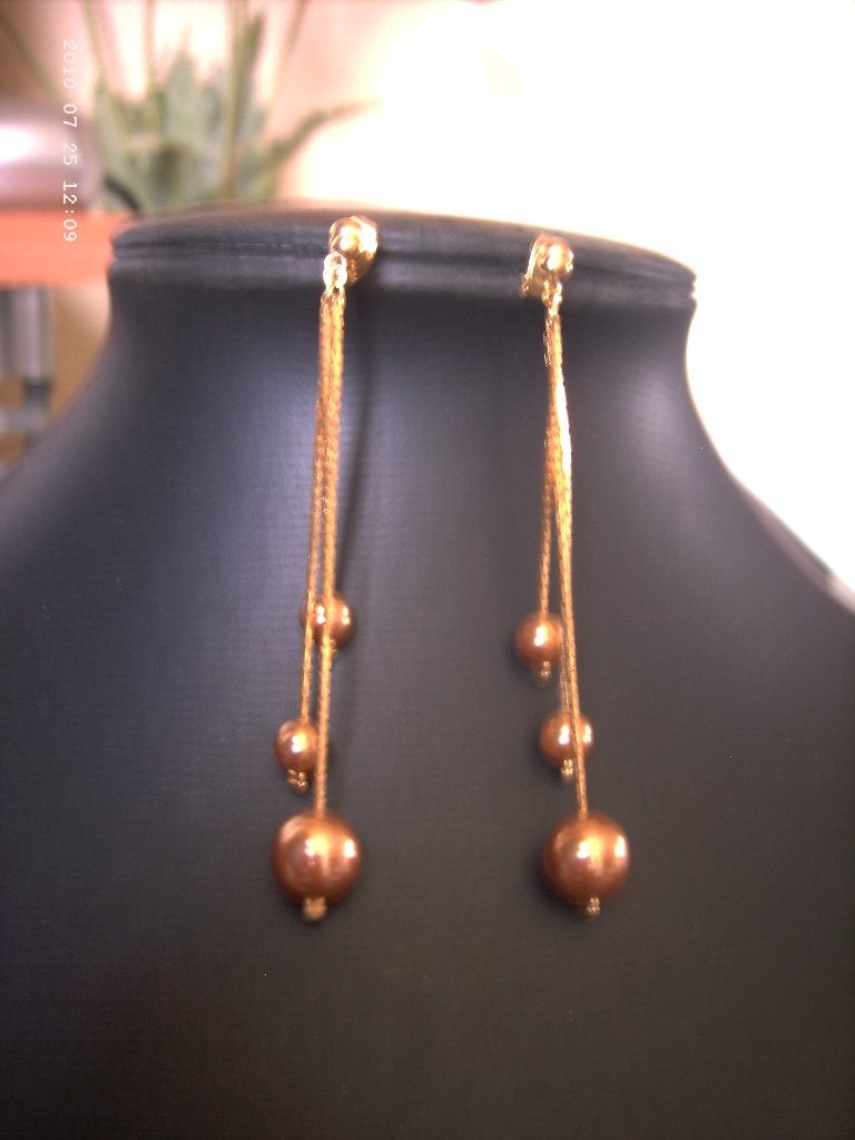 Een paar mooie Lange Goudkleurige Oorbellen, Sieraden, Tassen en Uiterlijk, Antieke sieraden, Verzenden, Overige materialen, Oorbellen