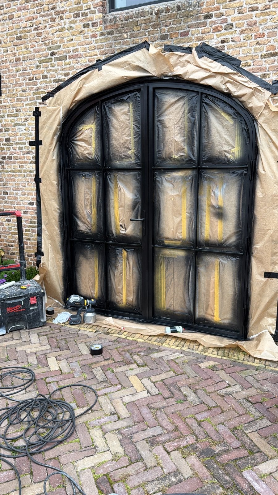 Herstel en spuiten van kozijnen en garagedeuren