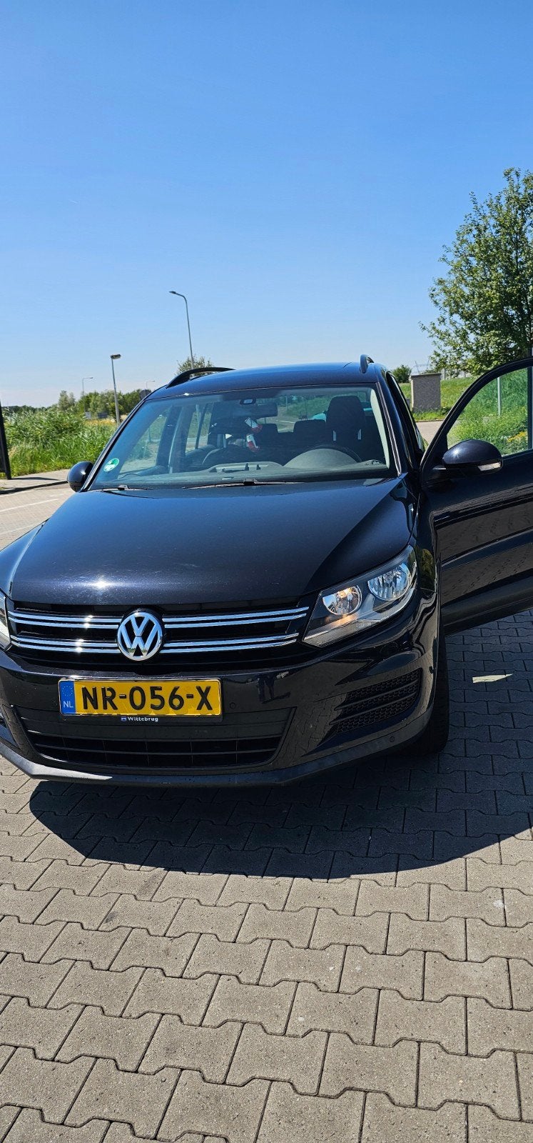 Volkswagen Tiguan 1.4 TSI 110KW DSG 2016 Zwart, Auto's, 15 km/l, 1800 kg, 4 cilinders, Zwart