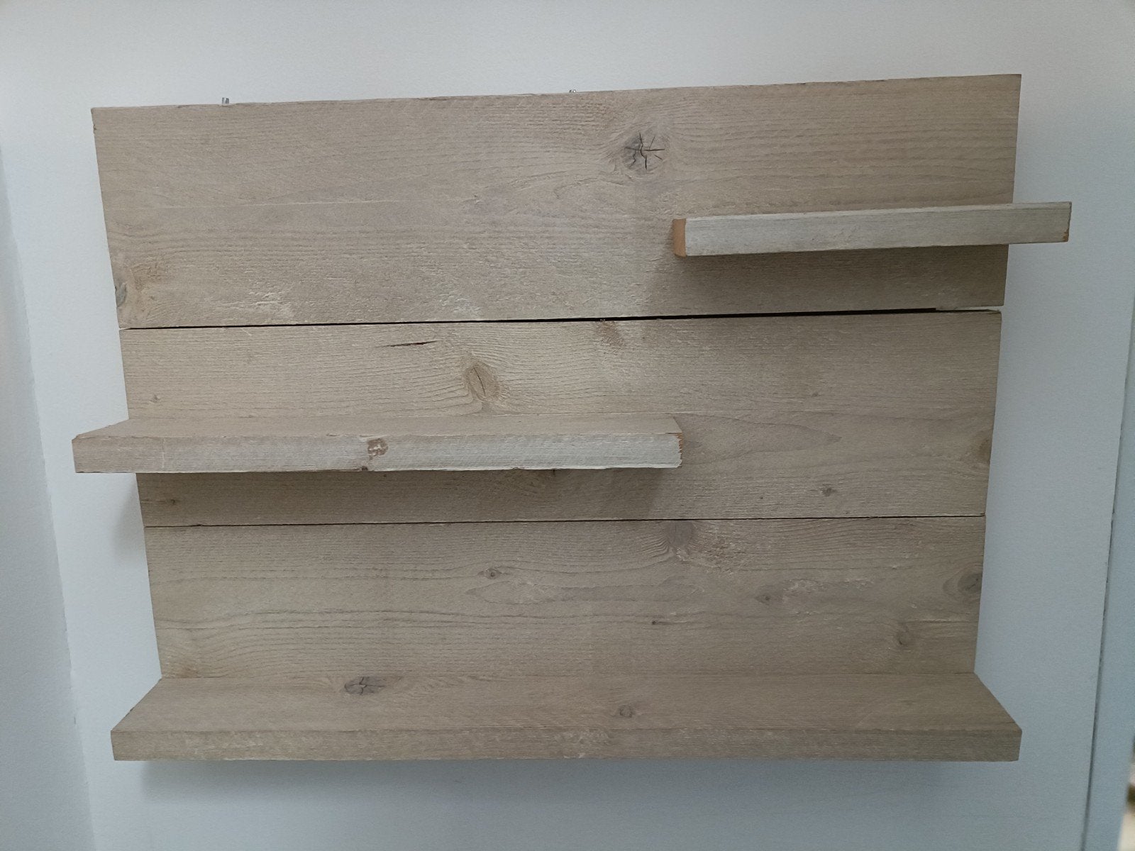 Steigerhouten wandplank, Ophalen