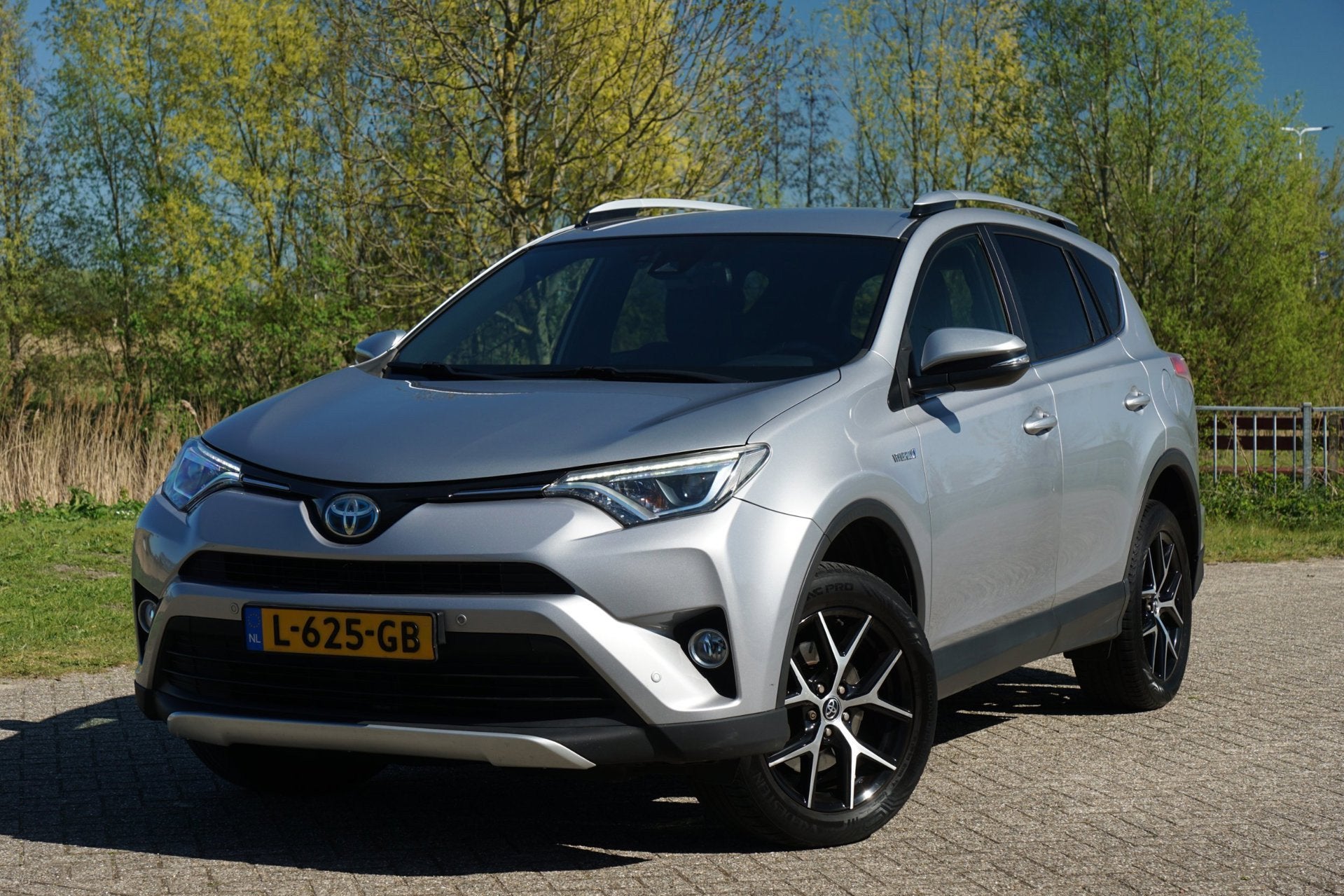 Toyota RAV4 2.5 Hybrid Style - Silver Sky - Compleet onderho, Auto's, Toyota, Gebruikt, Leder en Stof, Bedrijf, 155 pk