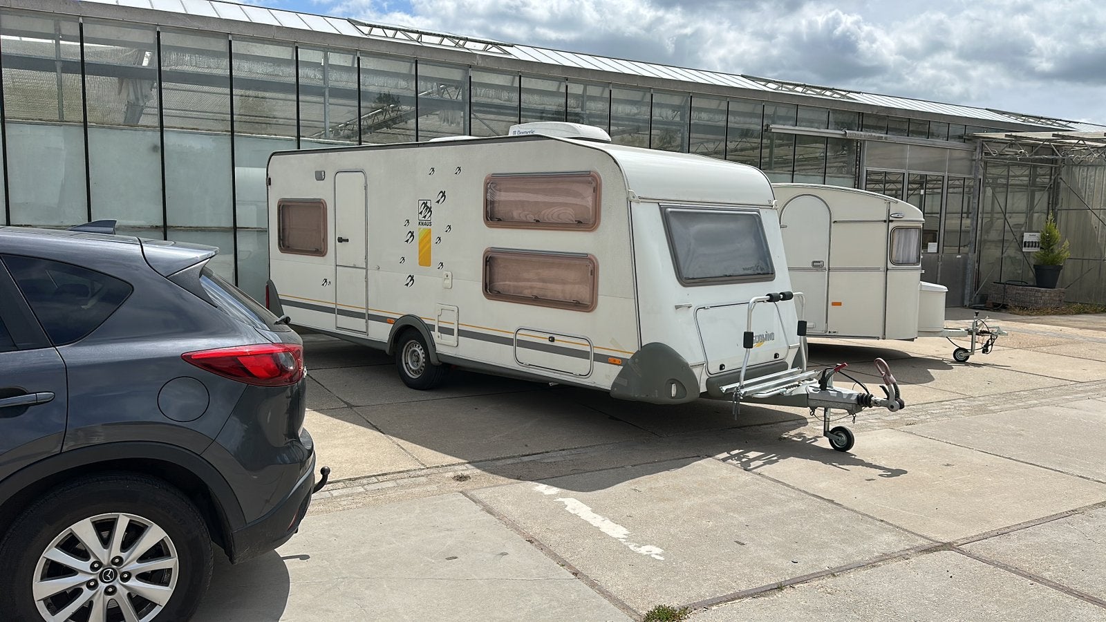 Complete Knaus Südwind 550 (6-persoons) + Airco & Luifel!, Rondzit, Koelkast, Particulier, 5 tot 6 meter