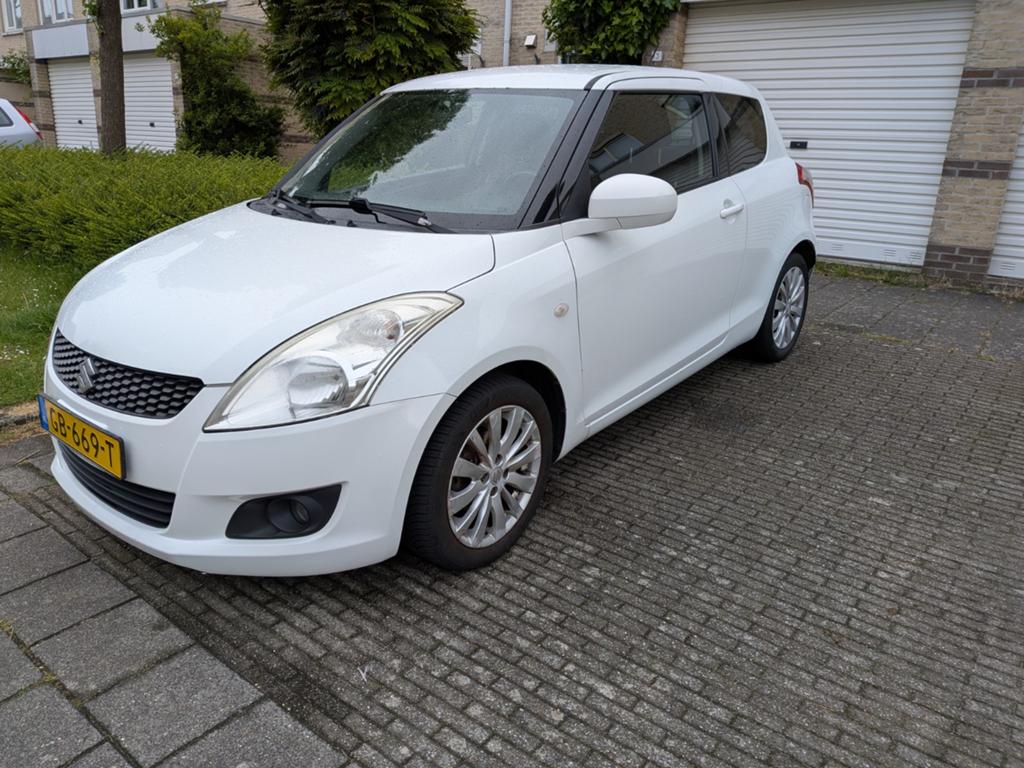 Suzuki Swift 1.2 3-D 2011 Wit, Voorwielaandrijving, Stof, Parkeersensor, Handgeschakeld