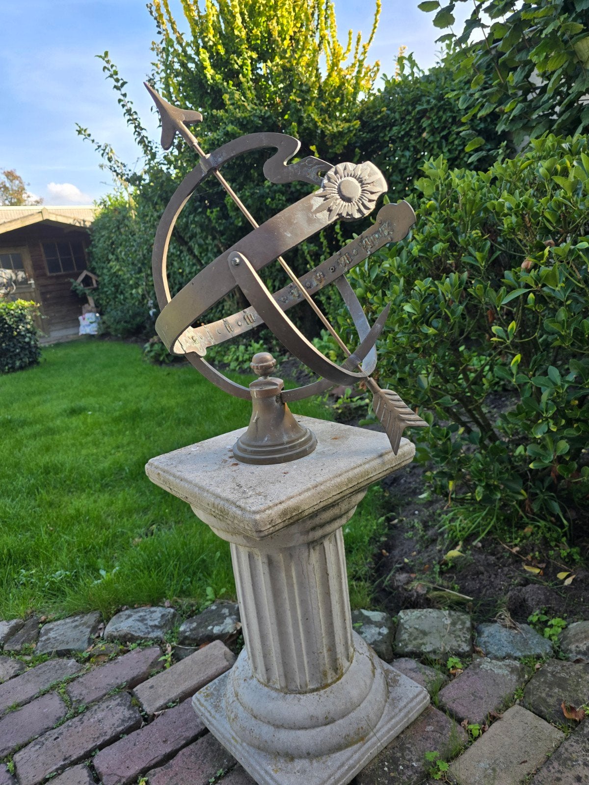 bronzen zonnewijzer met zuil, Ophalen