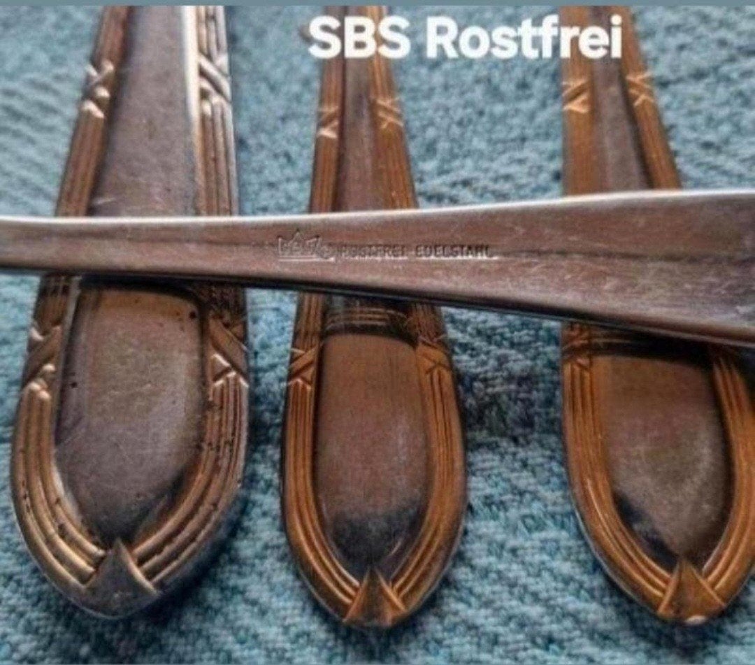 SBS Rostfrei Edelstahl Germany bestek relief kruisband goude, Huis en Inrichting, Ophalen of Verzenden, Zo goed als nieuw, Rvs of Chroom