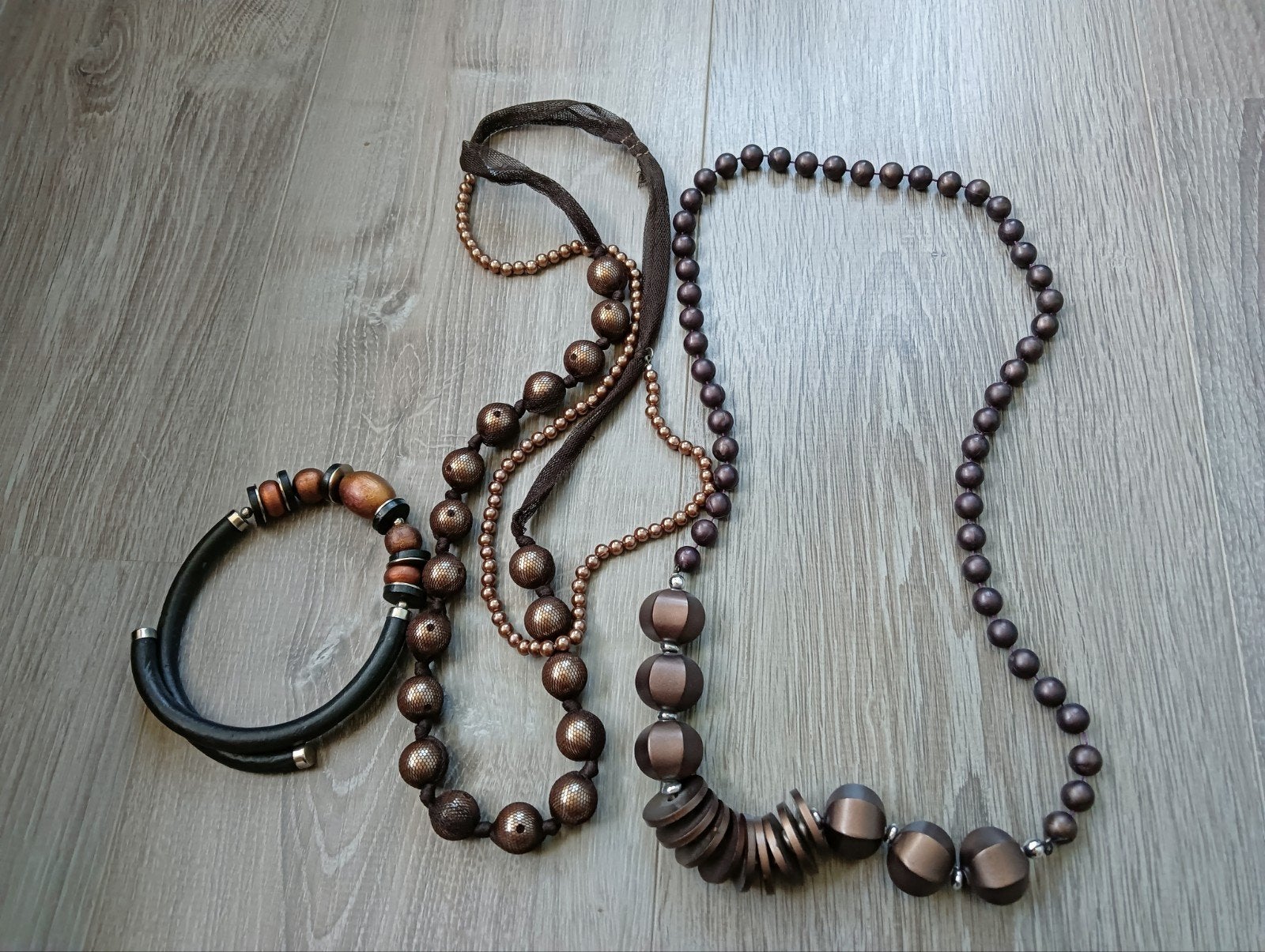 3 bruin gekleurde kettingen, Ophalen of Verzenden, Zo goed als nieuw, Bruin, Kunststof