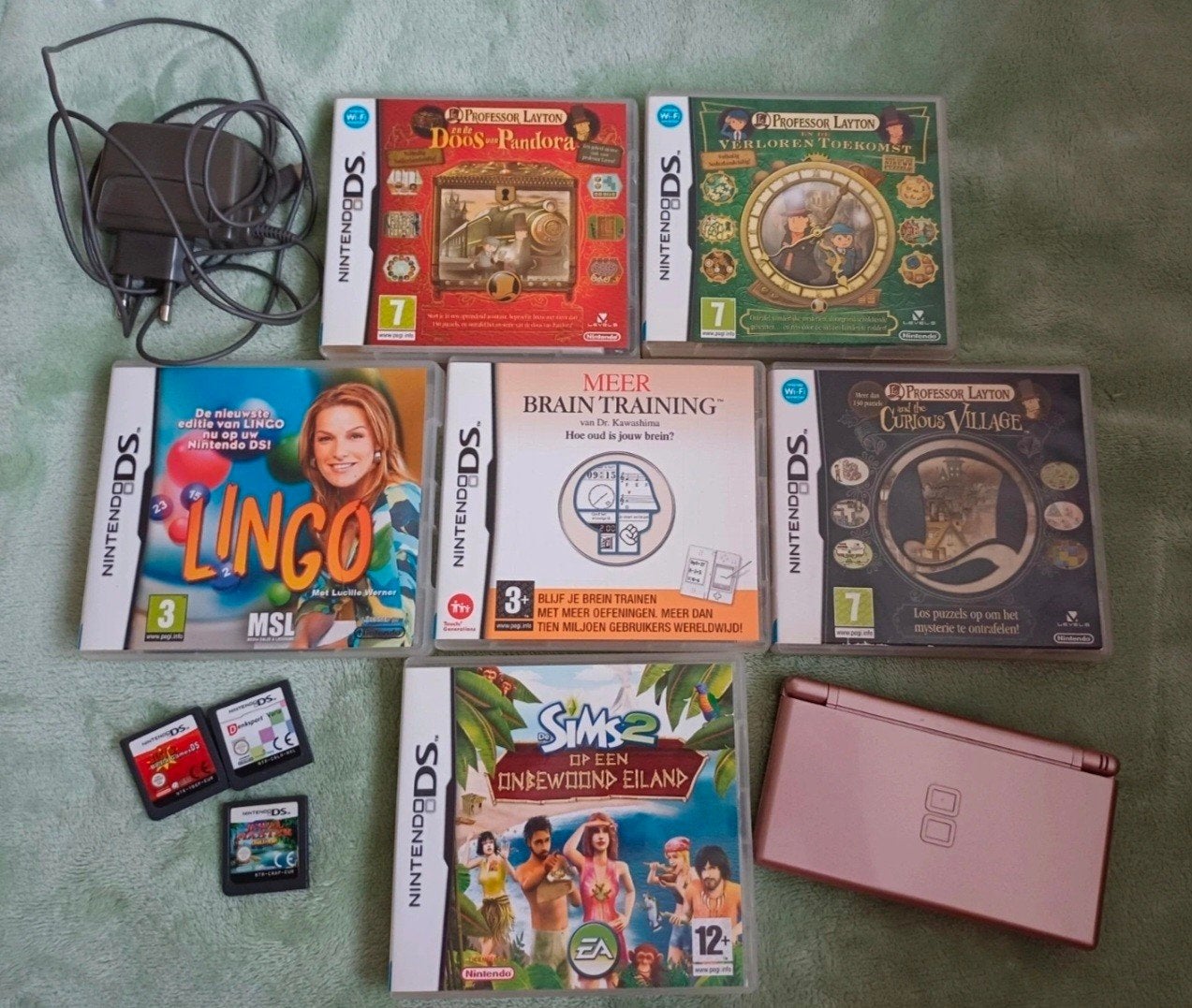 Nintendo DS met 9 games en oplader, Ophalen of Verzenden, Roze, DS Lite, Gebruikt