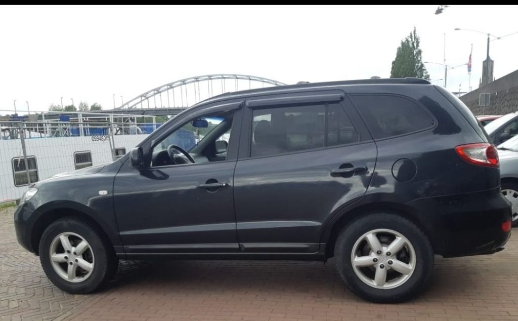 Hyundai Santa Fe 2.7 2WD 7-ST 2008 Zwart, Auto's, Hyundai, Voorwielaandrijving, Santa Fe, 2000 kg, Zwart
