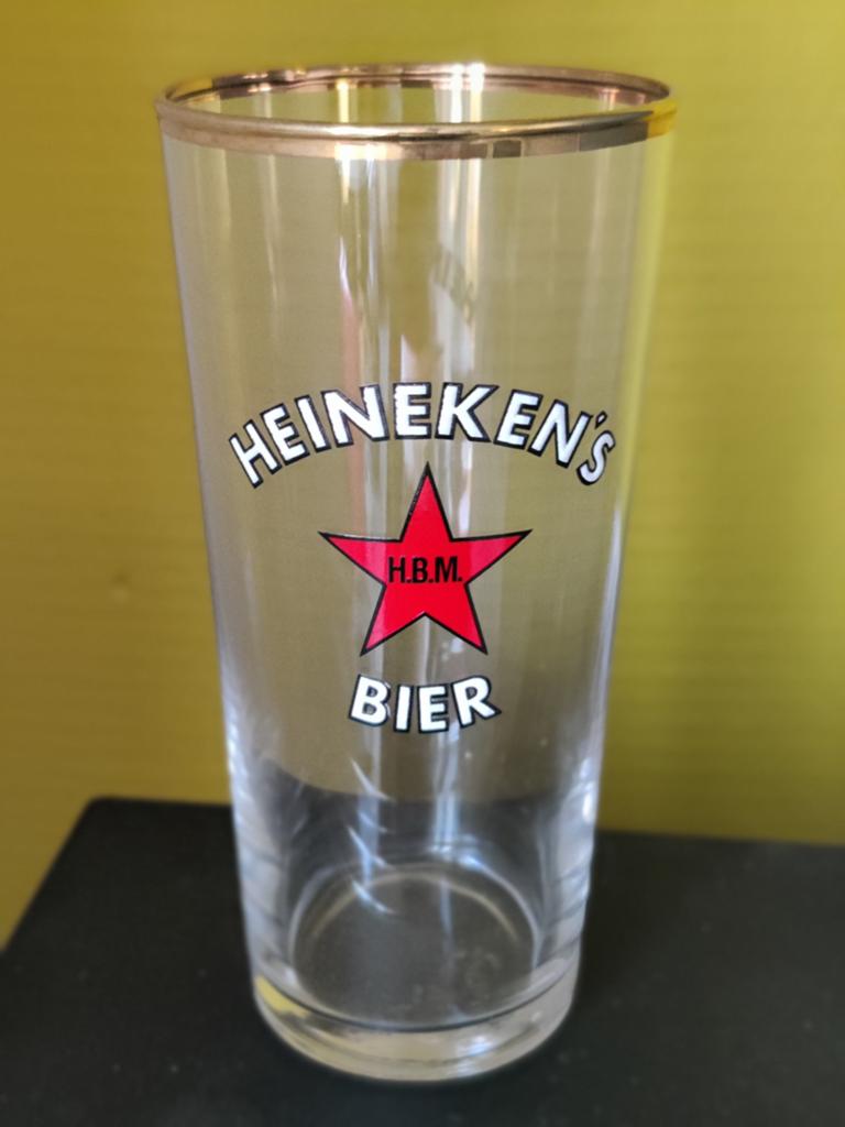Te koop: Oud Heineken glas met H.B.M. logo, Ophalen of Verzenden, Zo goed als nieuw, Glas of Glazen, Heineken