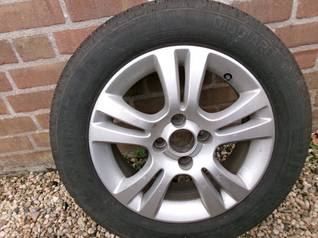 Te koop 4 Opel banden met alumiliumvelgen 185/65 x 15 inch, Auto-onderdelen, Banden en Velgen, Ophalen, Gebruikt, 15 inch, Banden en Velgen