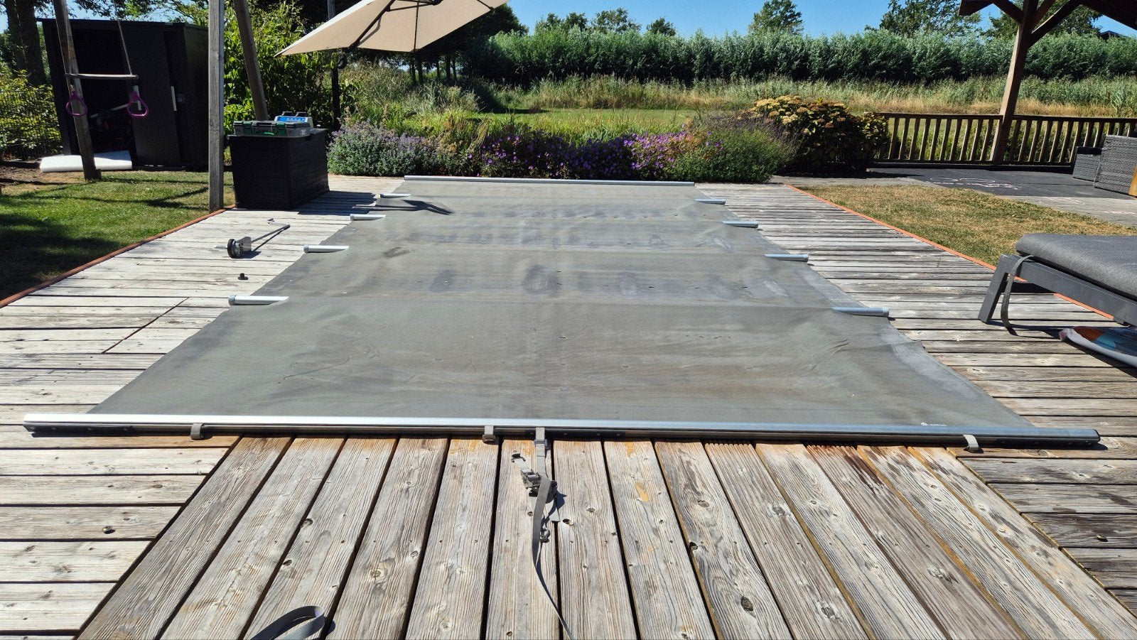 Zwembadafdekking 600x300CM buitenmaat met oprolsysteem, Ophalen, Gebruikt, Afdekzeil