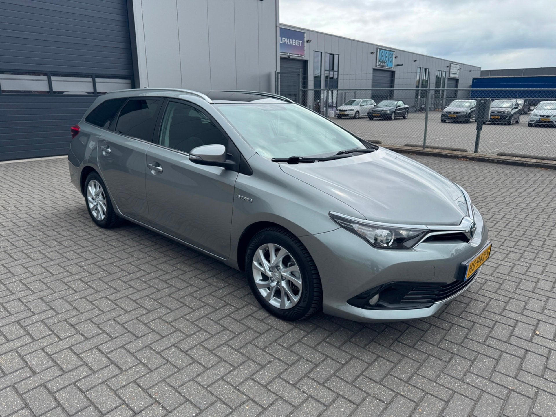 Toyota Auris Touring Sports 1.8 Hybrid Lease, Auto's, Toyota, 12 maanden, 28 km/l, Gebruikt, Euro 6