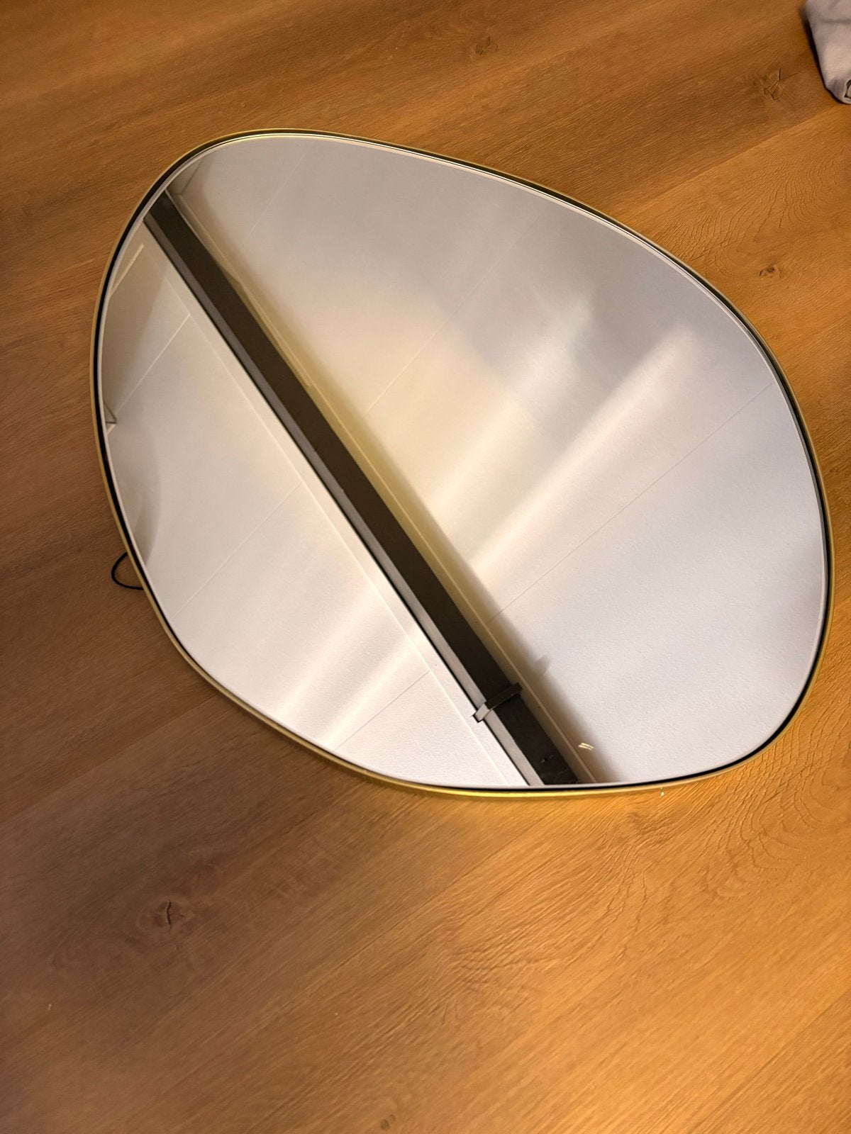 Sissy-Boy spiegel, organische vorm, goudkleurig frame, Huis en Inrichting, Woonaccessoires | Spiegels, Ophalen, 100 tot 150 cm